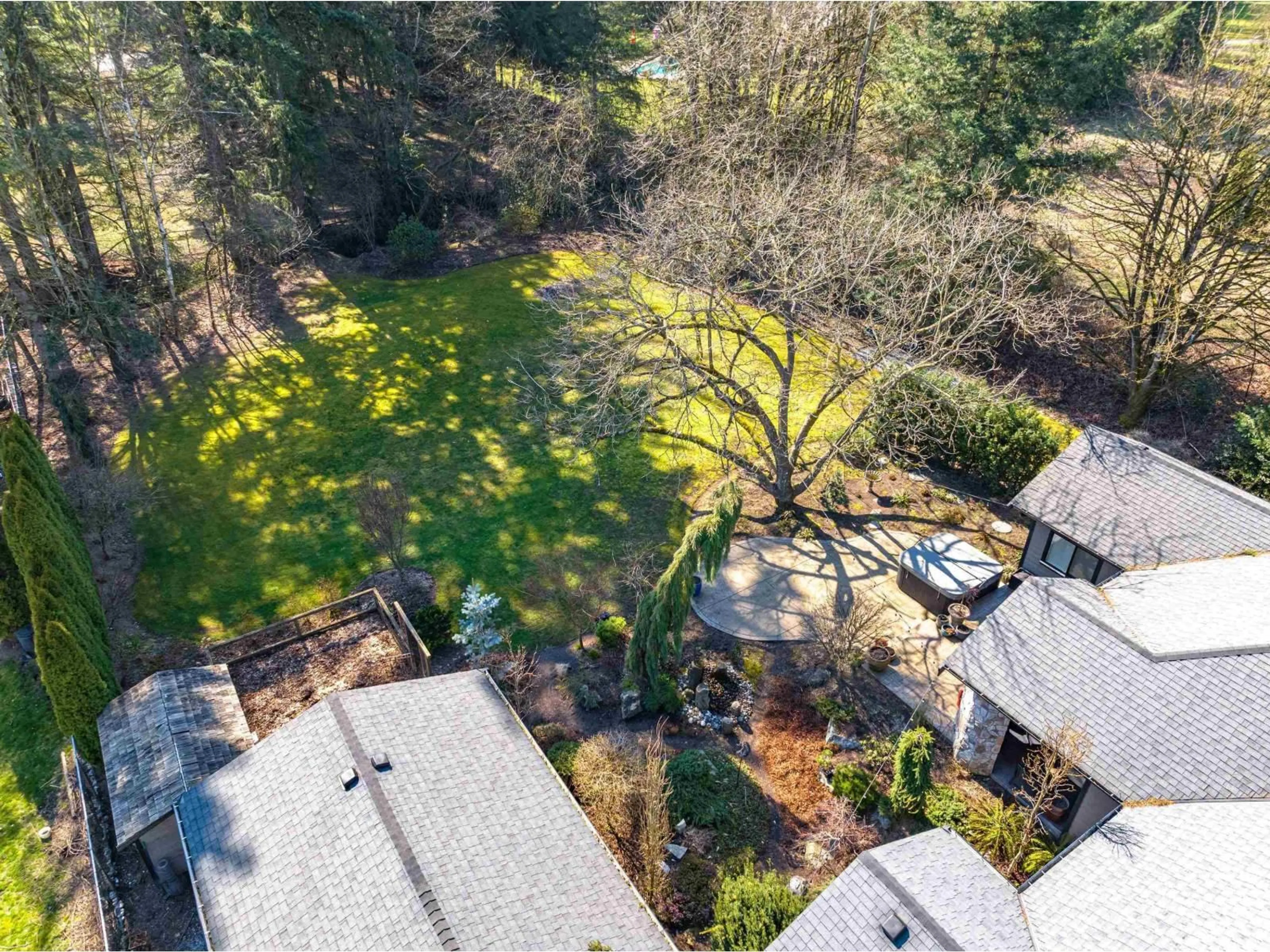 A pic from outside/outdoor area/front of a property/back of a property/a pic from drone, forest/trees view for 23716 46B AVENUE, Langley British Columbia V2Z2S9