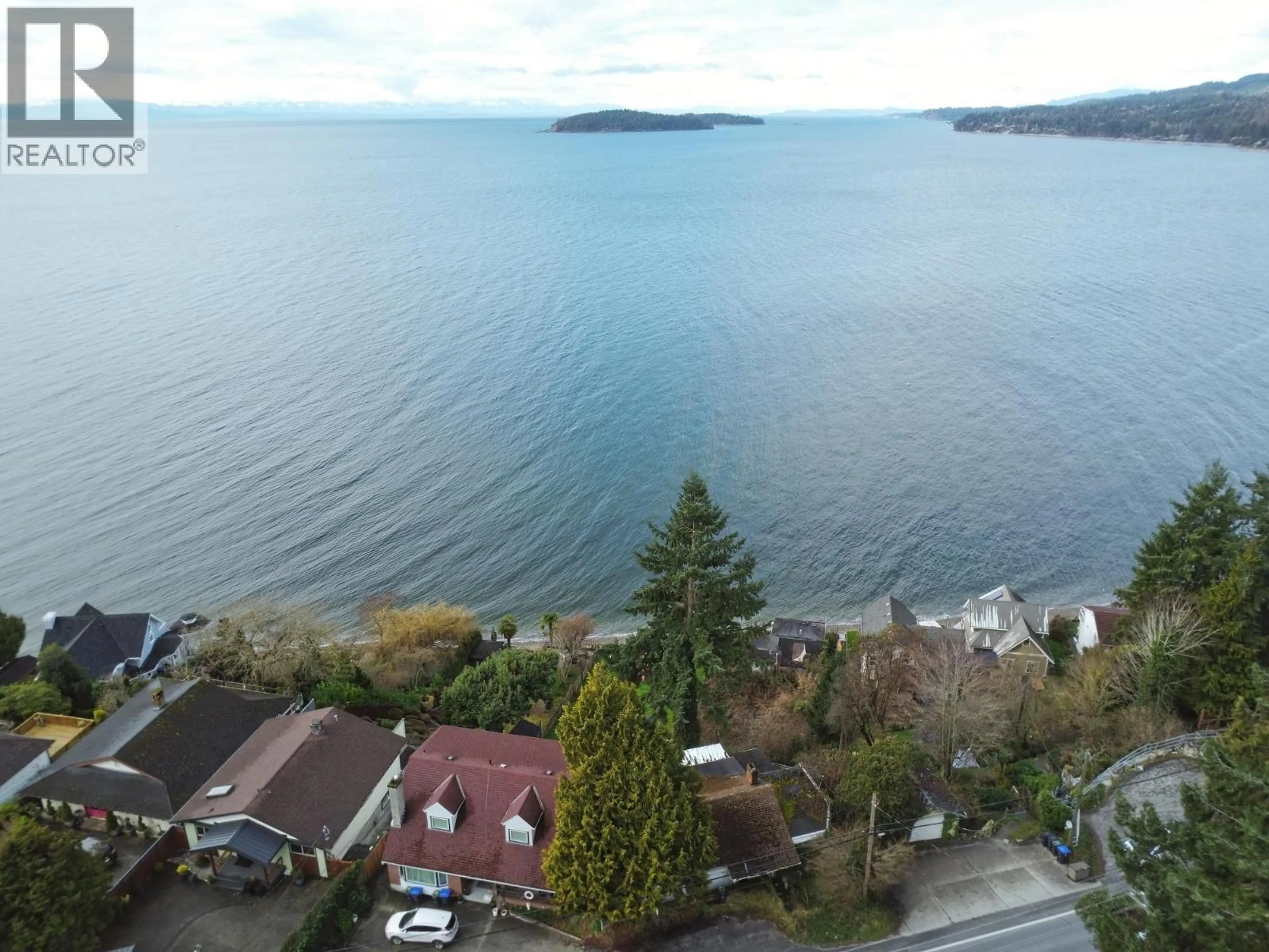 A pic from outside/outdoor area/front of a property/back of a property/a pic from drone, water/lake/river/ocean view for 5225B SUNSHINE COAST HIGHWAY, Sechelt British Columbia V7Z0C4