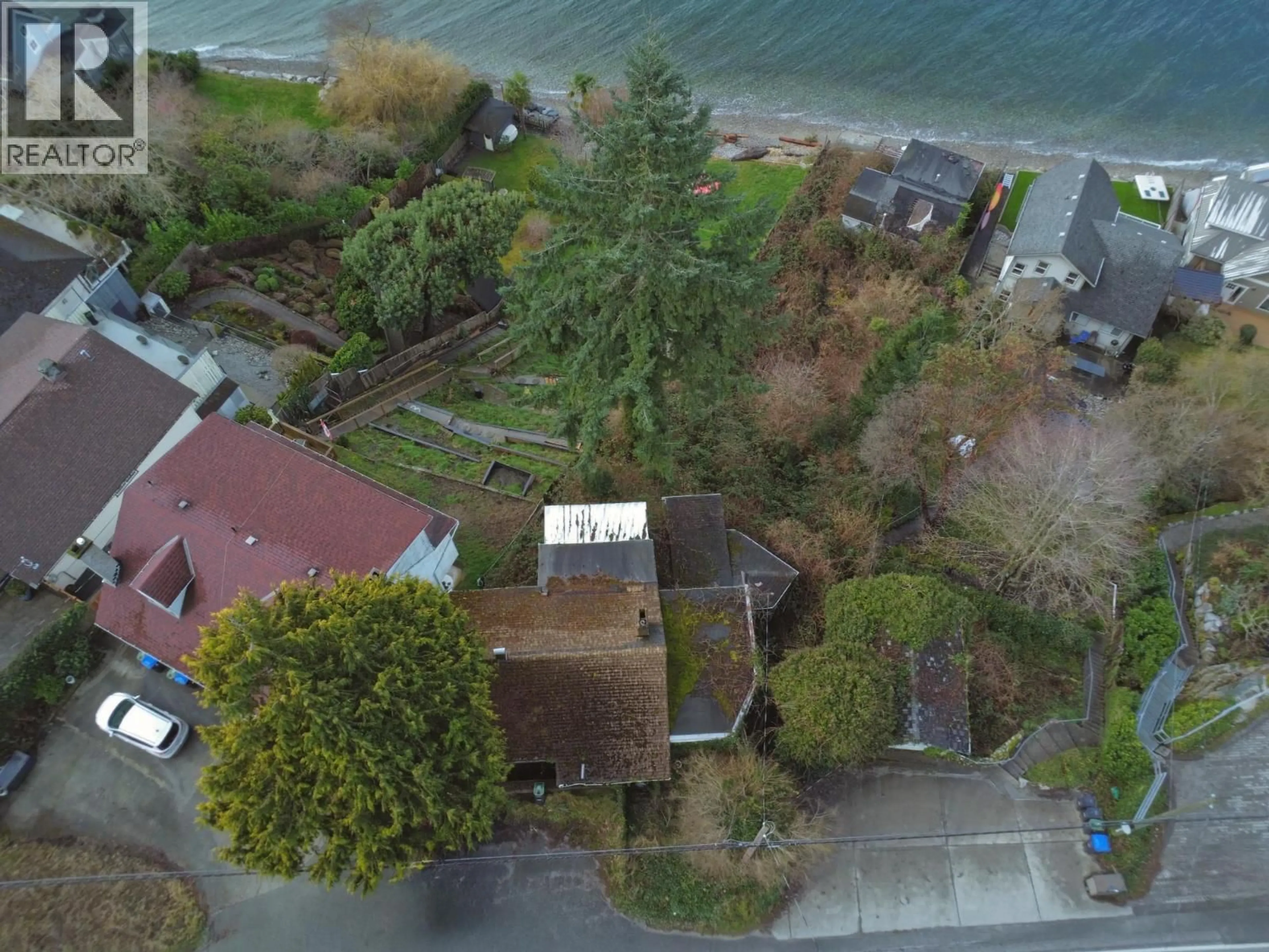 A pic from outside/outdoor area/front of a property/back of a property/a pic from drone, water/lake/river/ocean view for 5225B SUNSHINE COAST HIGHWAY, Sechelt British Columbia V7Z0C4