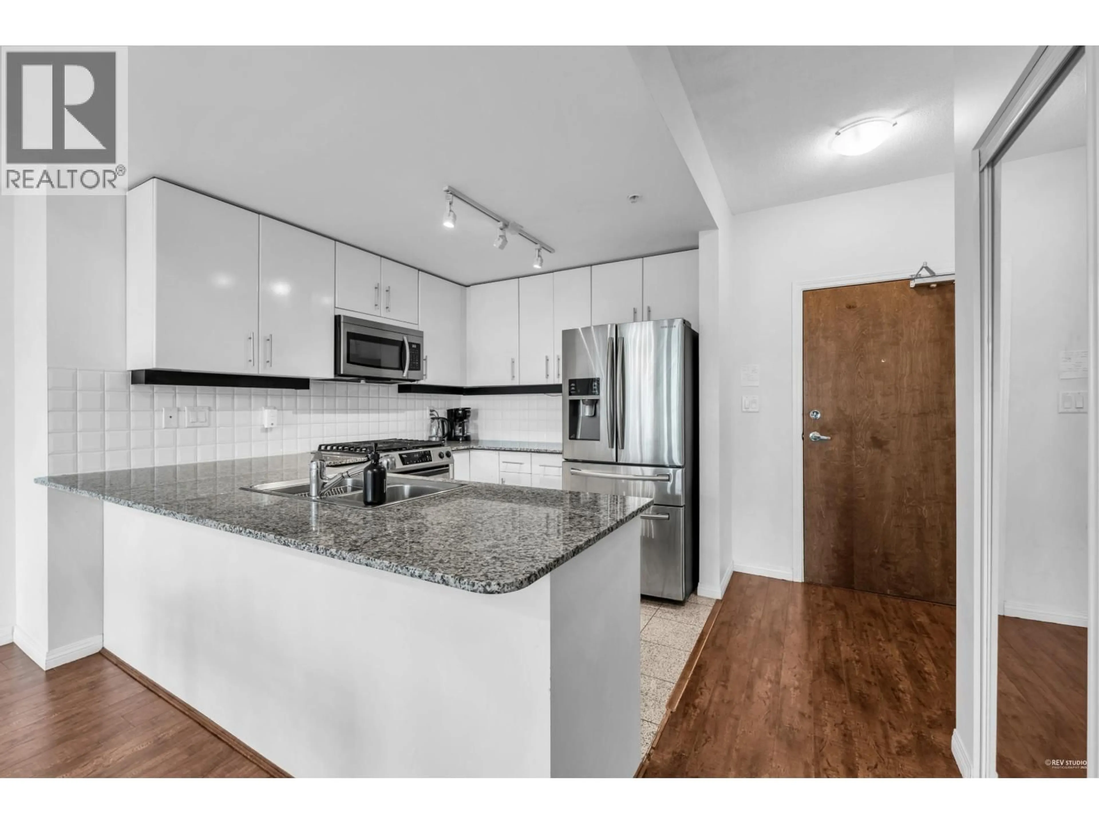 Open concept kitchen, unknown for 409 - 100 ESPLANADE STREET, North Vancouver British Columbia V7L4V1