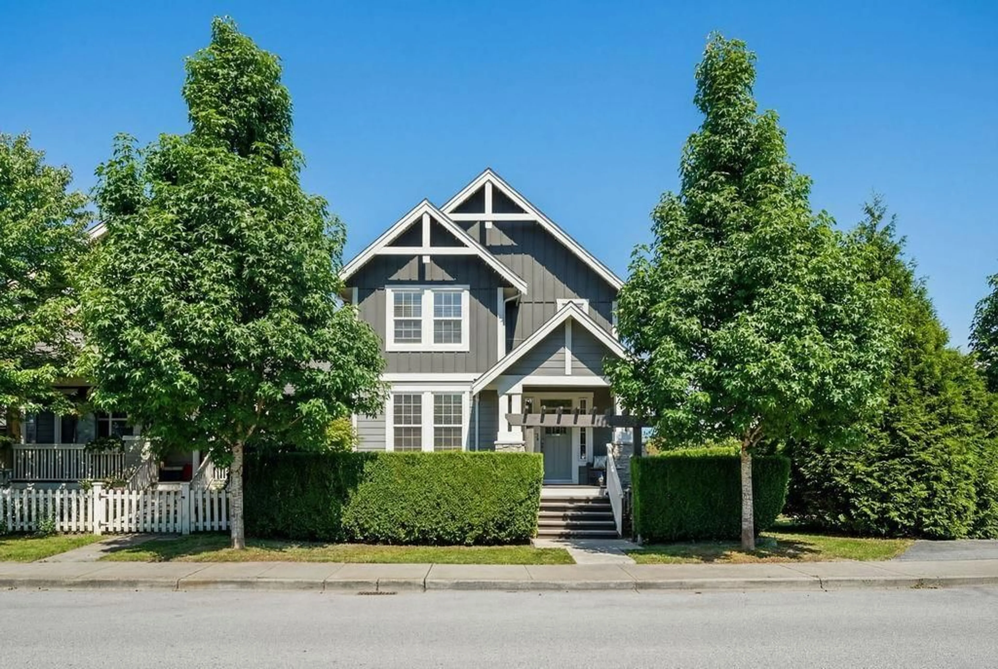 Home with vinyl exterior material, street for 23043 BILLY BROWN ROAD, Langley British Columbia V1M4G2