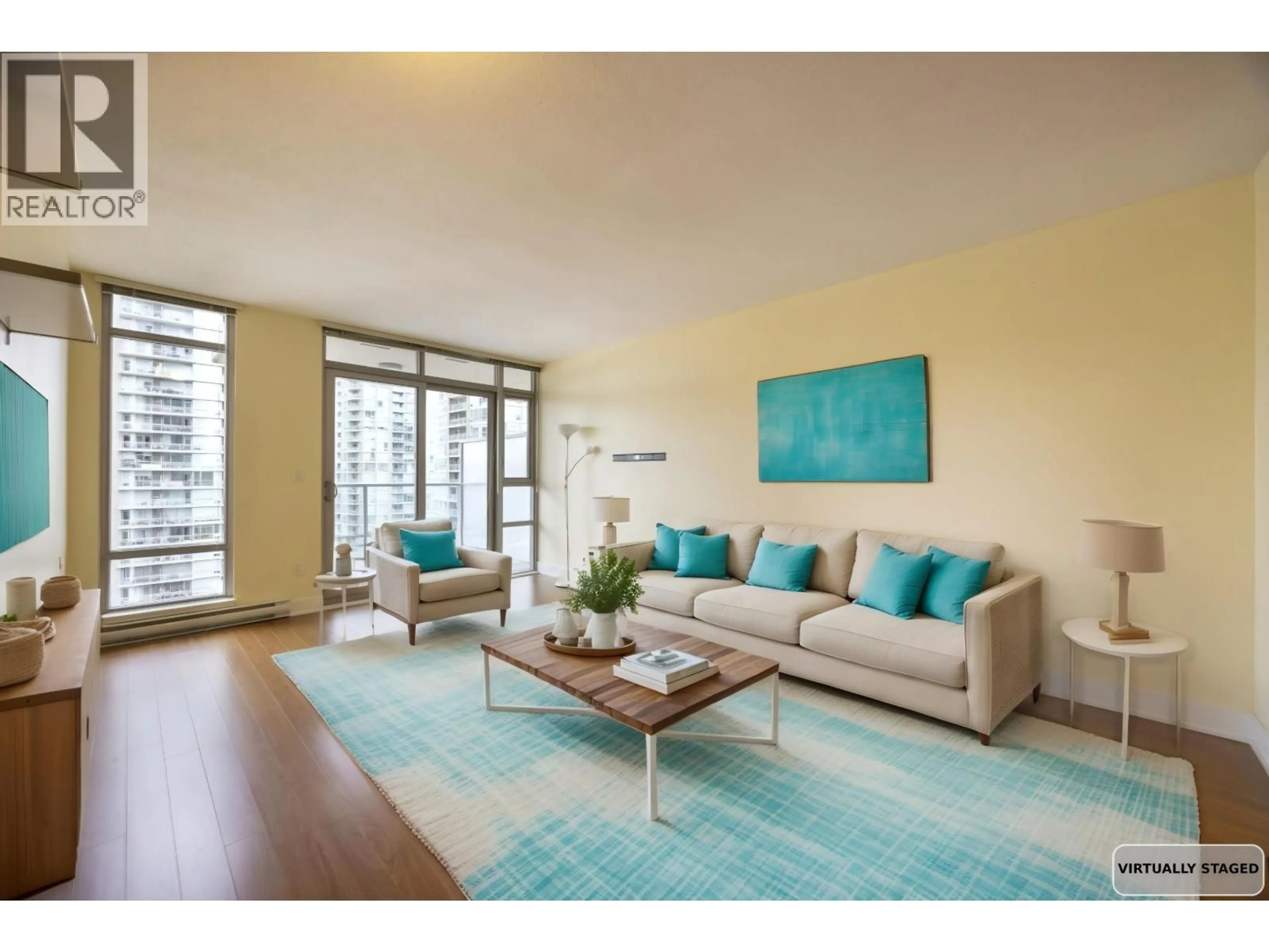 Living room with furniture, wood/laminate floor for 2002 1155 THE HIGH ST, Coquitlam British Columbia V3B7W4