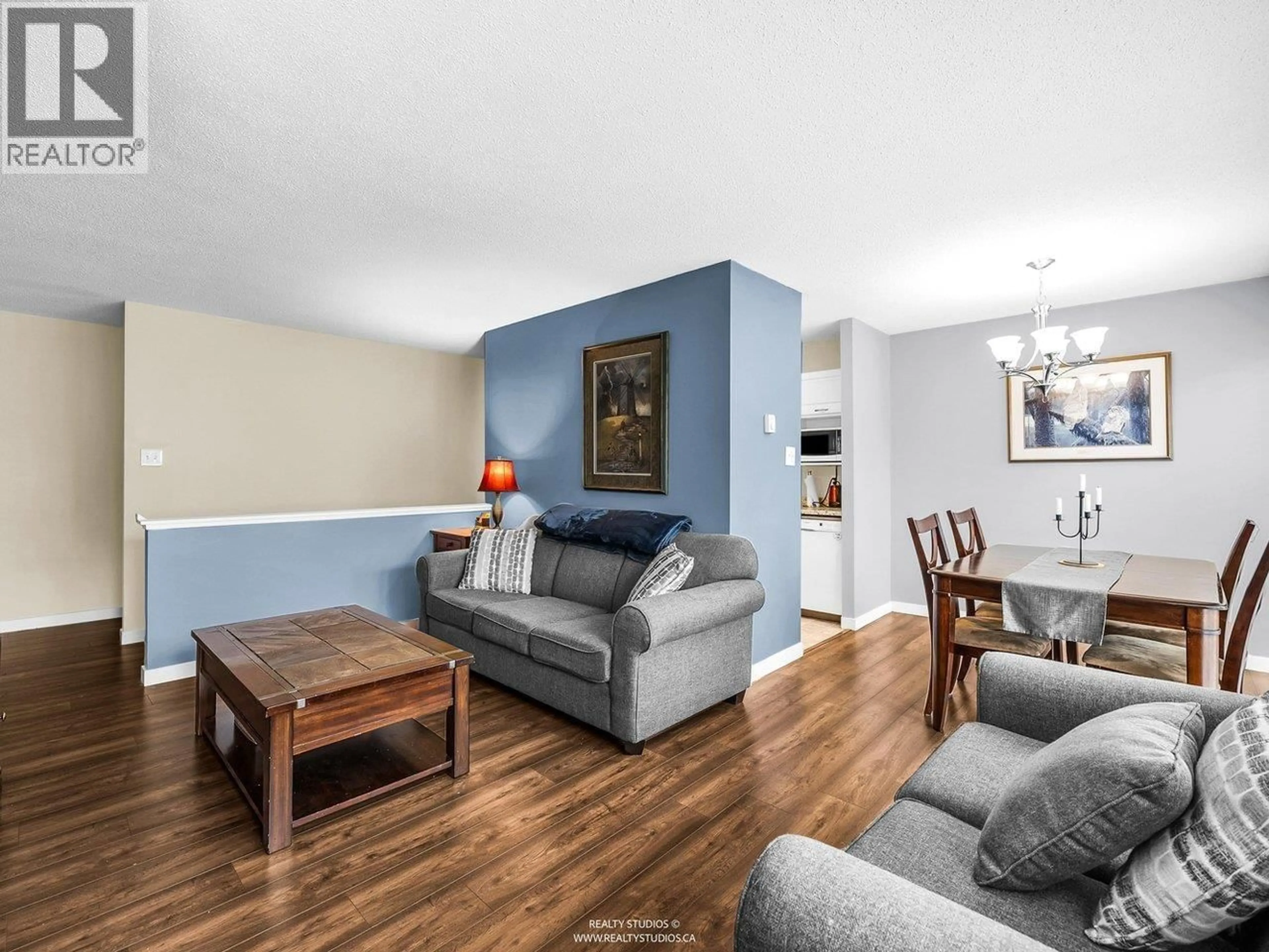 Living room with furniture, wood/laminate floor for 21 - 10200 4TH AVENUE, Richmond British Columbia V7E1V3