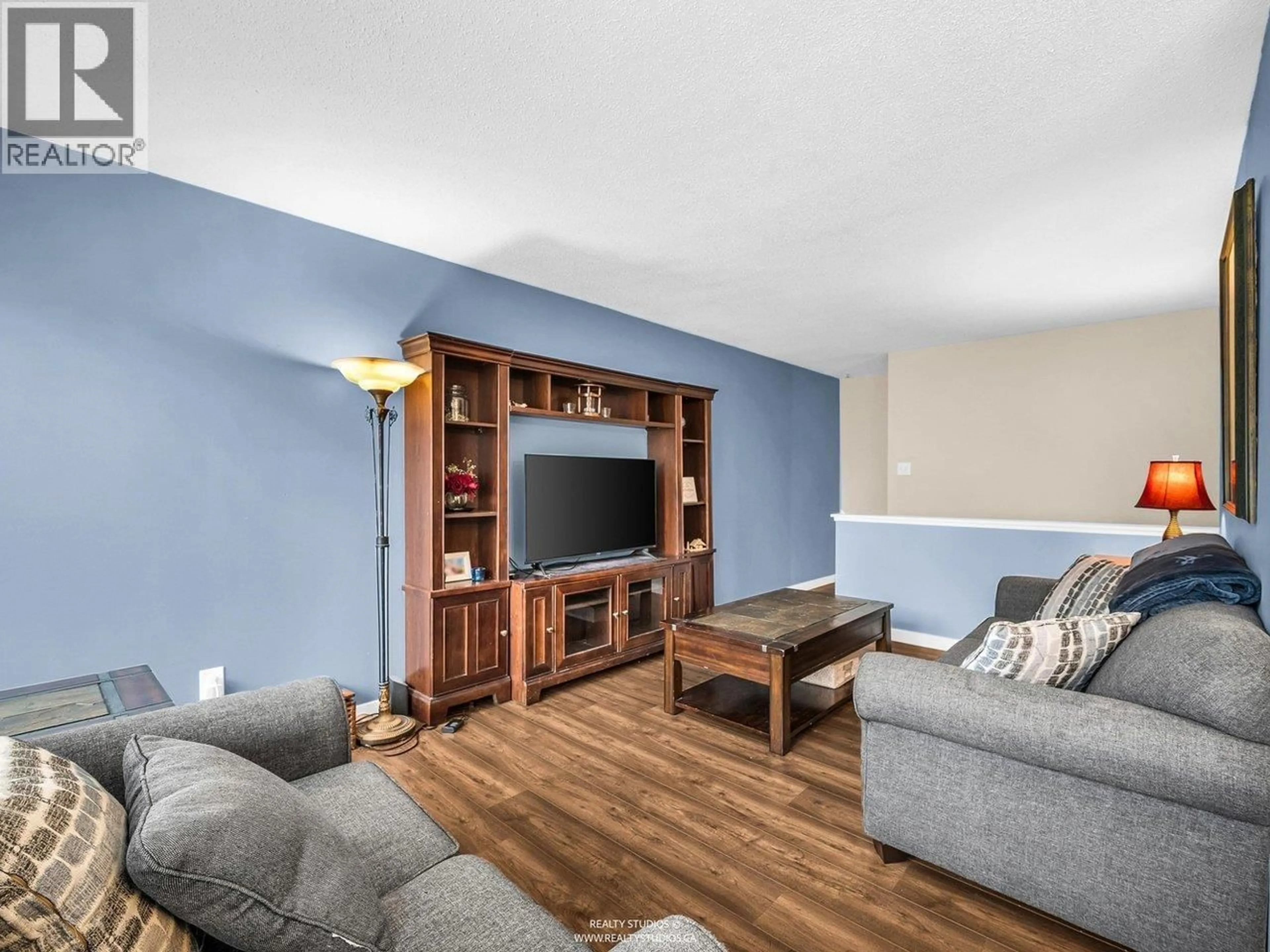 Living room with furniture, wood/laminate floor for 21 - 10200 4TH AVENUE, Richmond British Columbia V7E1V3