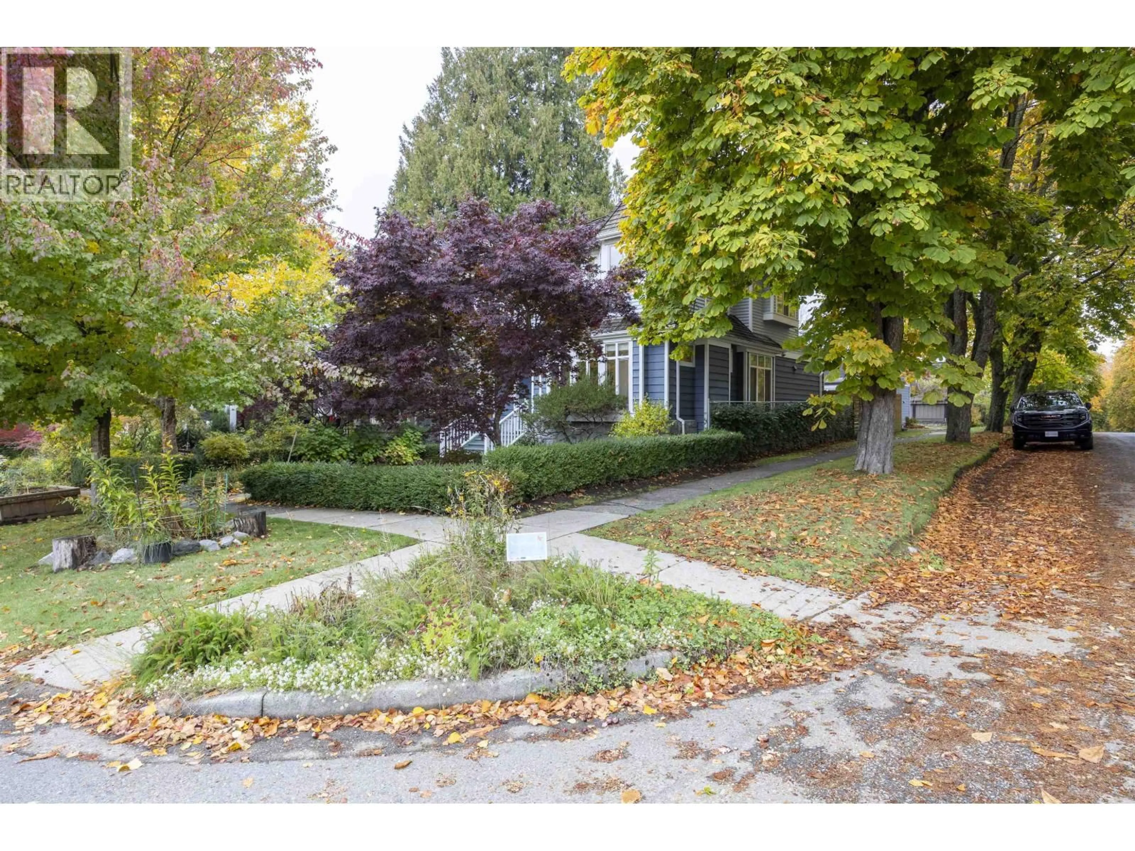 A pic from outside/outdoor area/front of a property/back of a property/a pic from drone, street for 4203 14TH AVENUE, Vancouver British Columbia V6R2X7