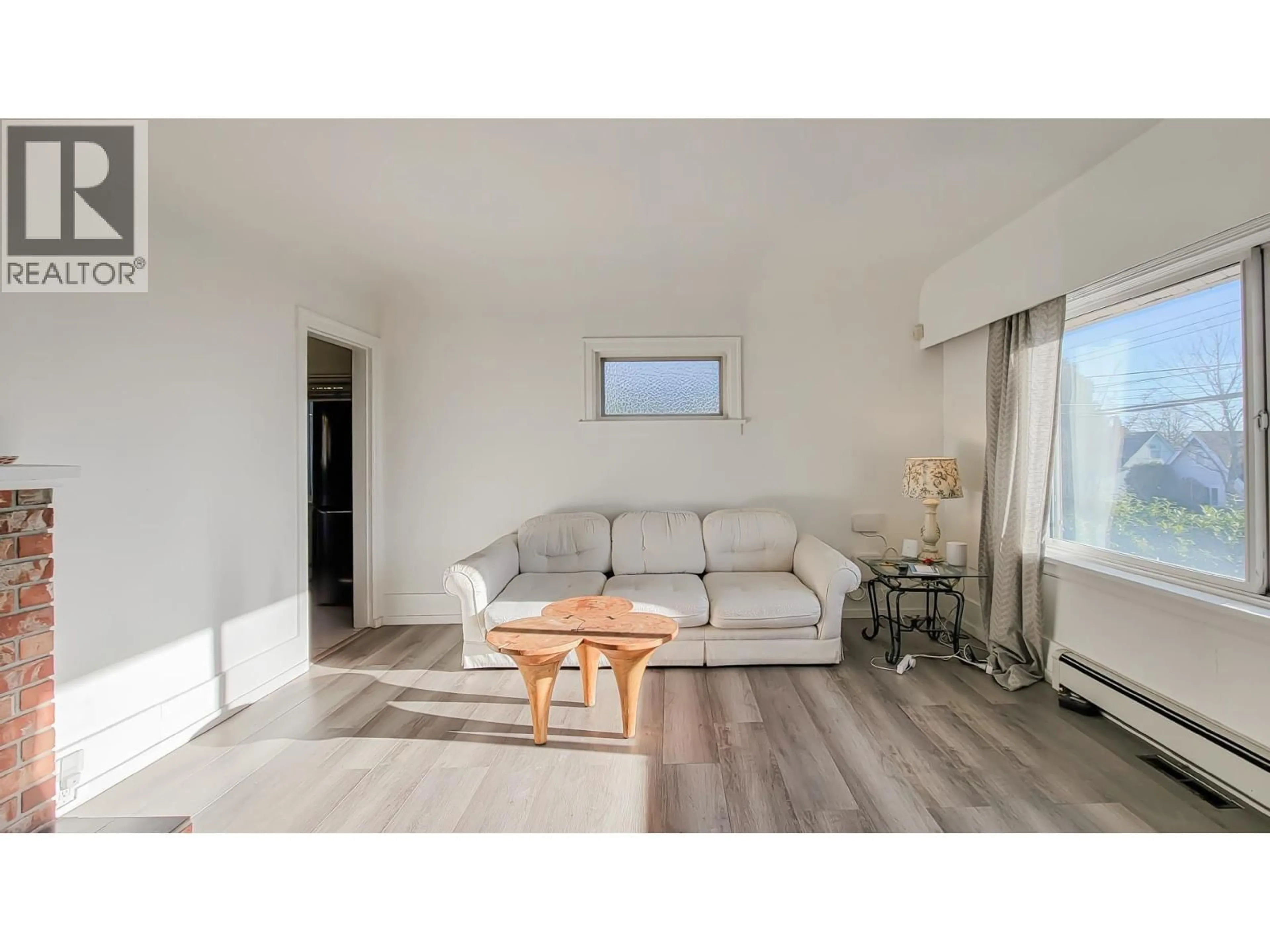 Living room with furniture, wood/laminate floor for 1515 EIGHTH AVENUE, New Westminster British Columbia V3M2S5