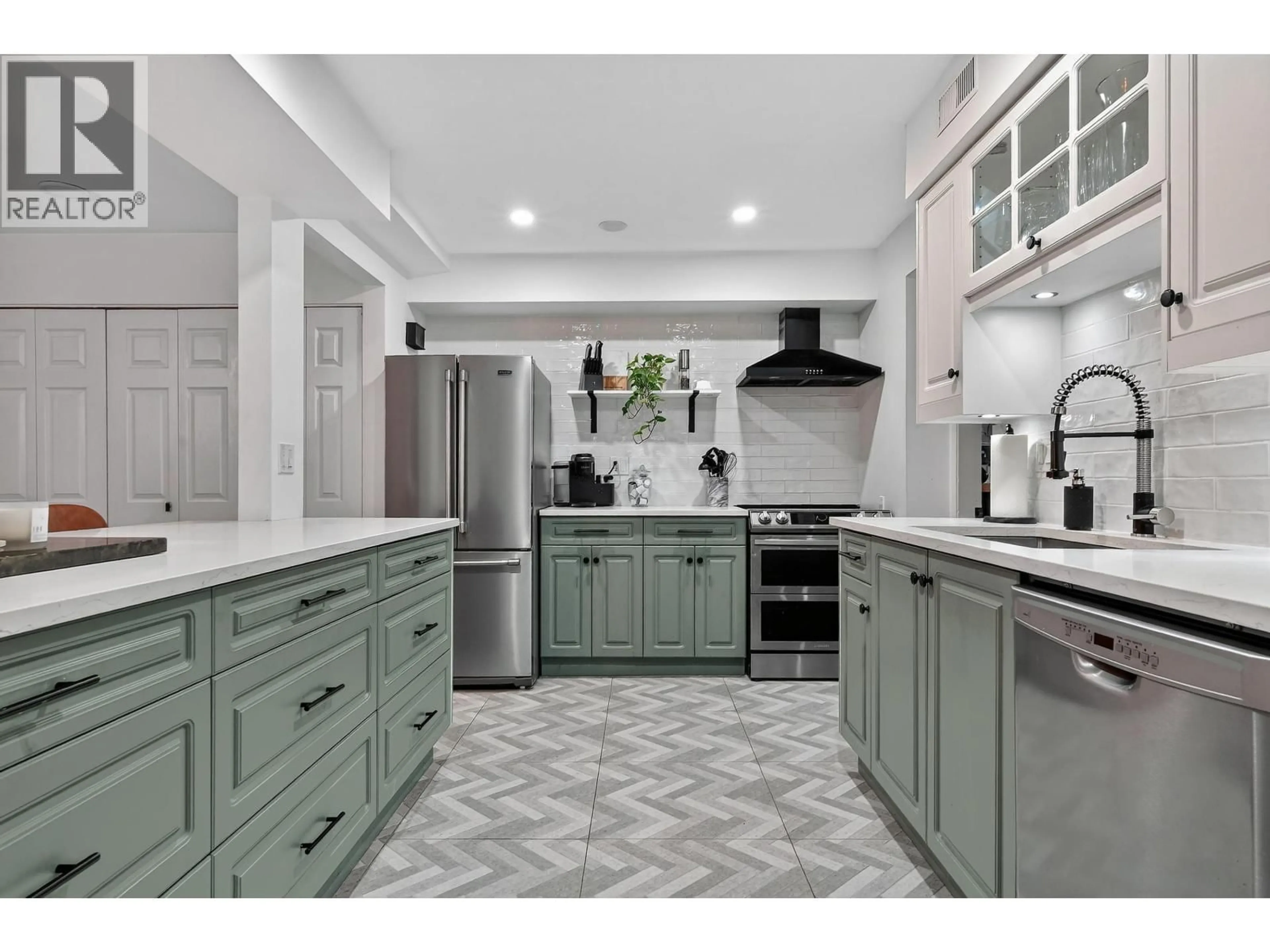 Open concept kitchen, ceramic/tile floor for 7355 CAPISTRANO DRIVE, Burnaby British Columbia V5A1P7