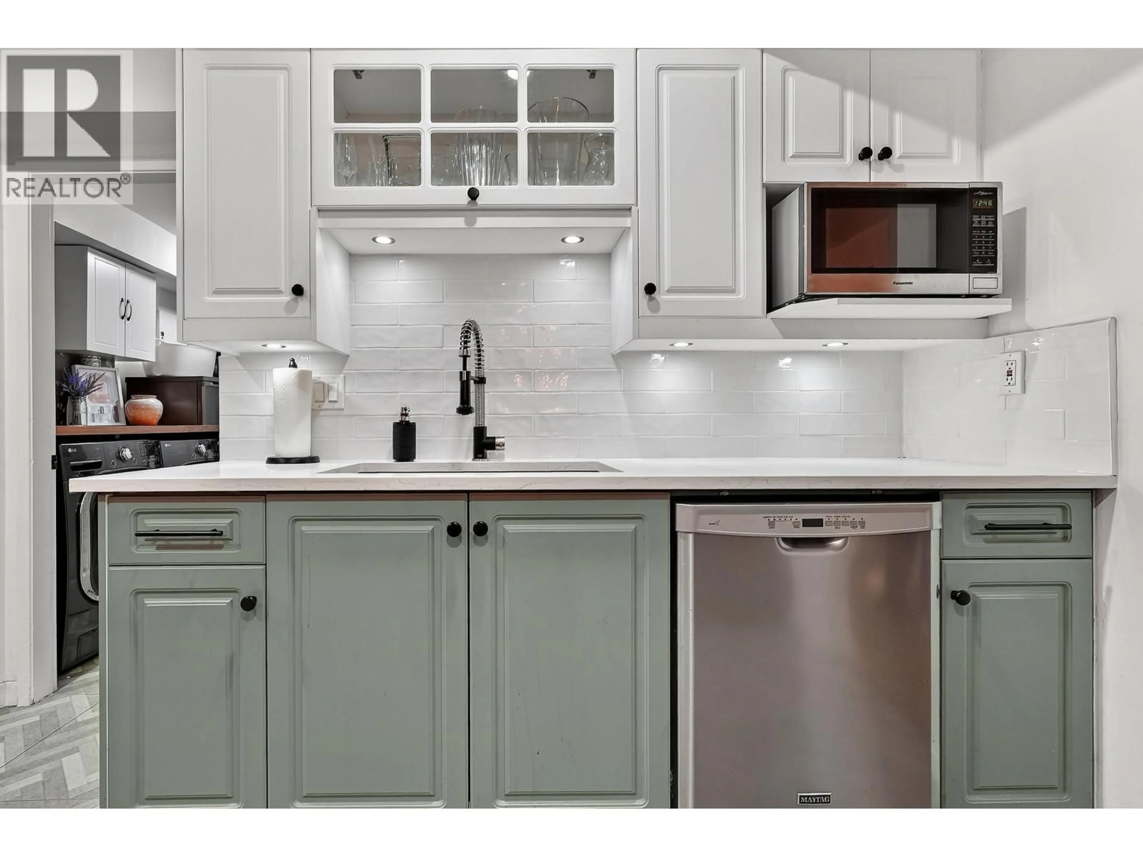 Open concept kitchen, ceramic/tile floor for 7355 CAPISTRANO DRIVE, Burnaby British Columbia V5A1P7