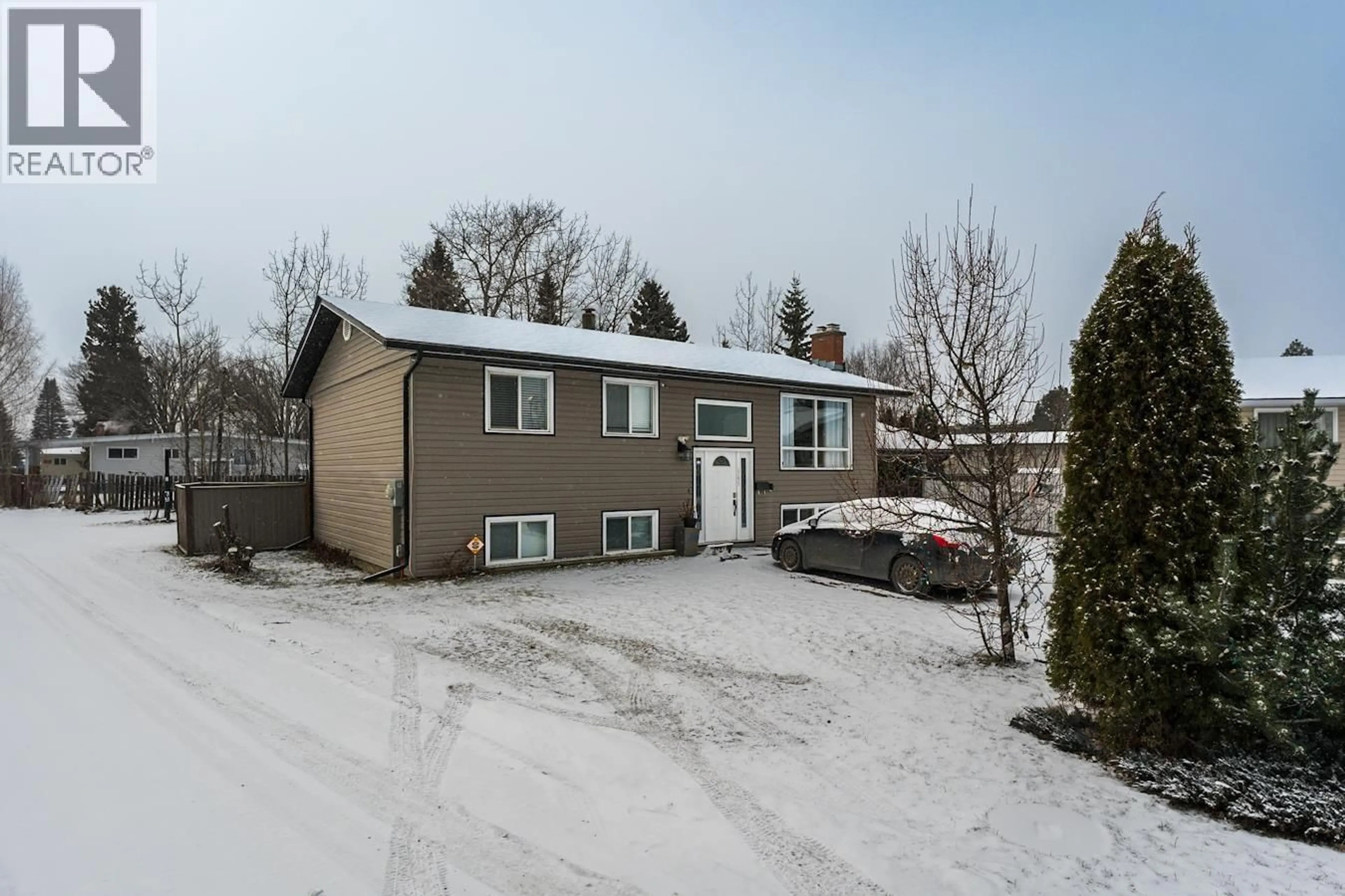 A pic from outside/outdoor area/front of a property/back of a property/a pic from drone, street for 1795 IRWIN STREET, Prince George British Columbia V2M2Y6