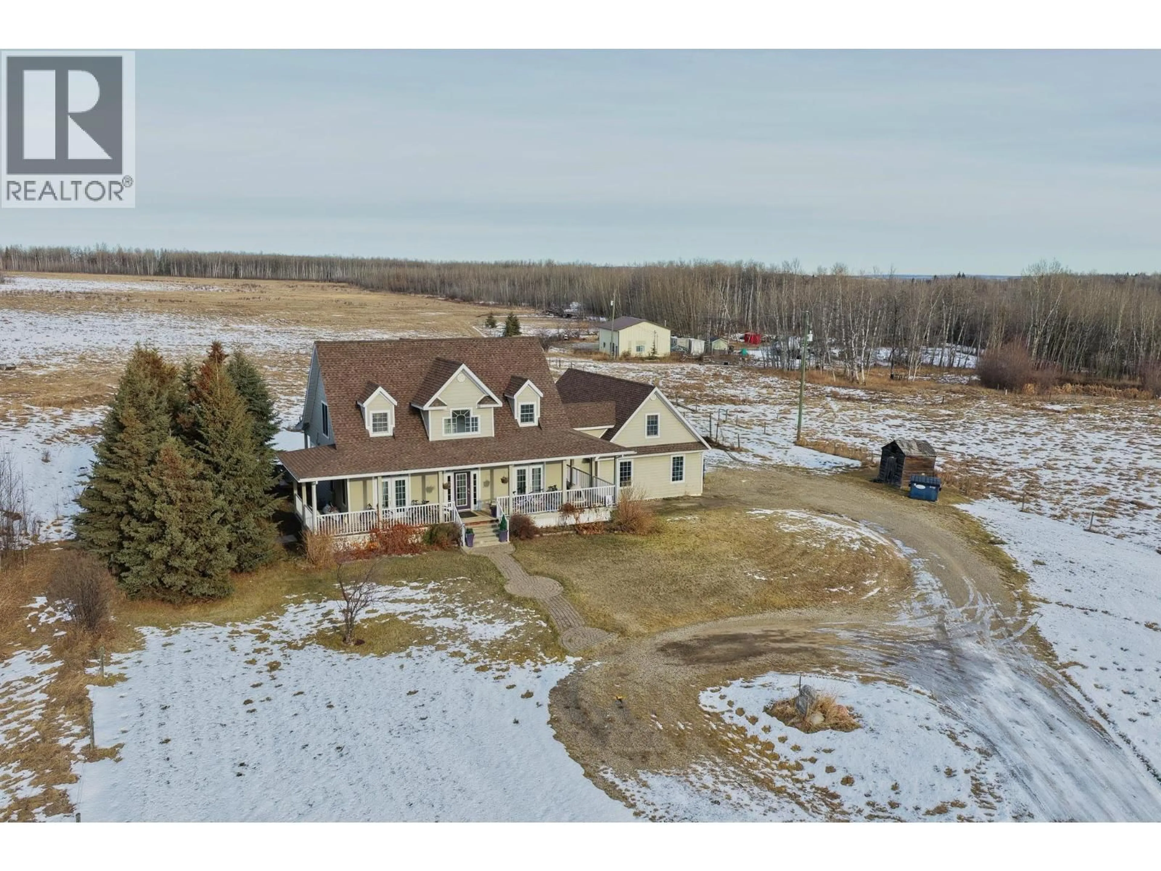 A pic from outside/outdoor area/front of a property/back of a property/a pic from drone, unknown for 10706 244 ROAD, Fort St. John British Columbia V1J8J6