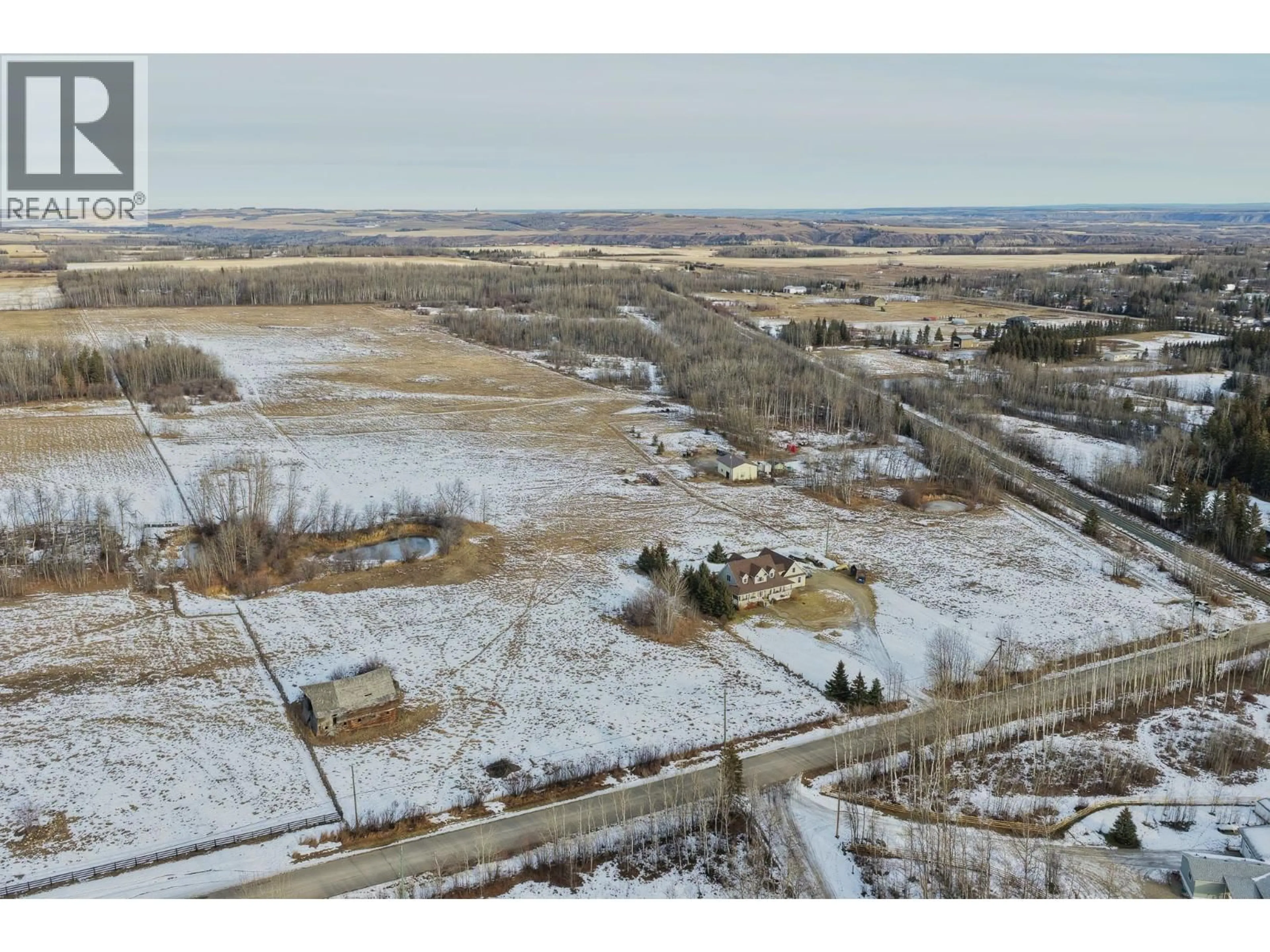 A pic from outside/outdoor area/front of a property/back of a property/a pic from drone, unknown for 10706 244 ROAD, Fort St. John British Columbia V1J8J6