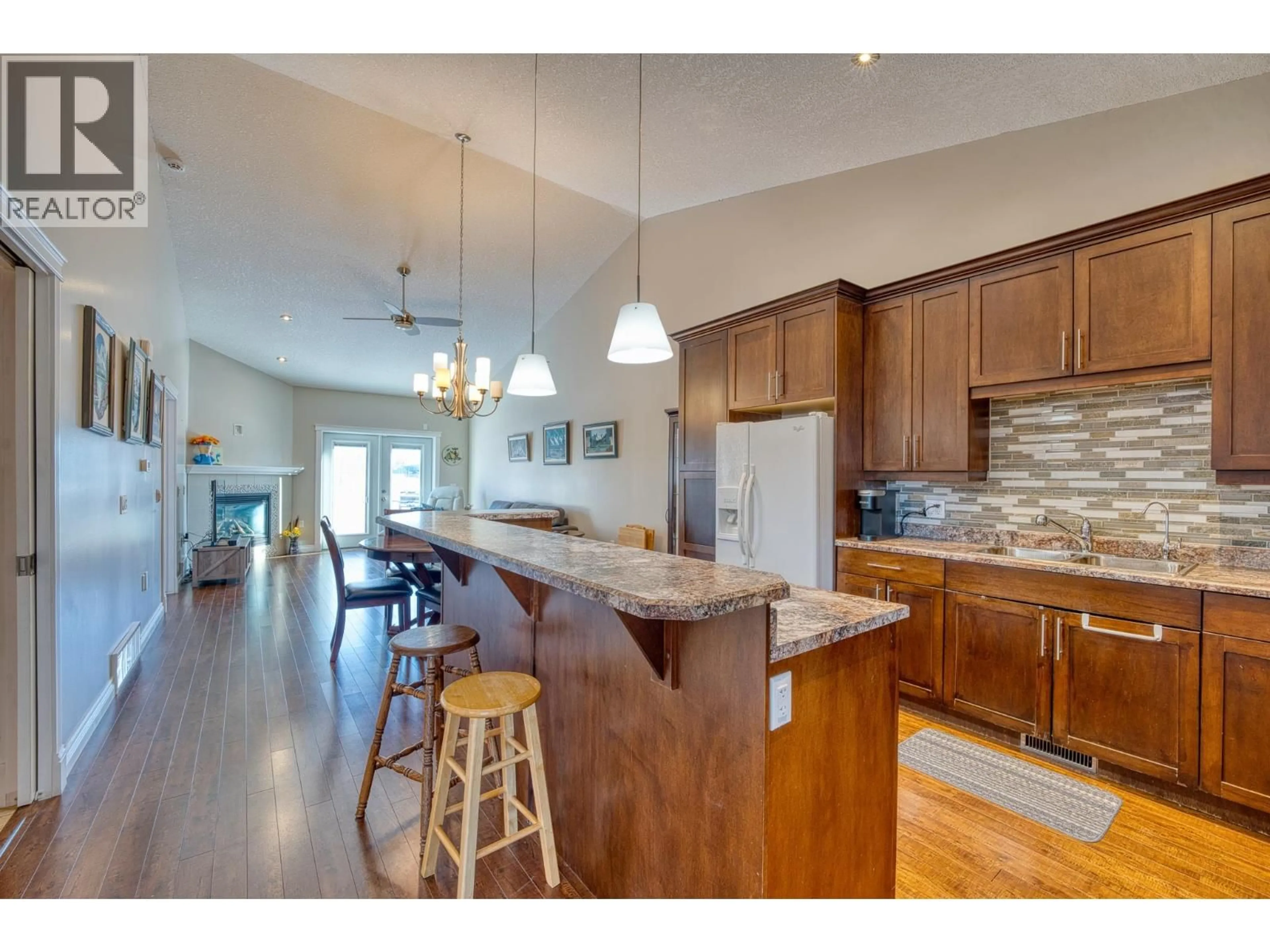 Open concept kitchen, unknown for 104 - 9803 117 AVENUE, Fort St. John British Columbia V1J0E9