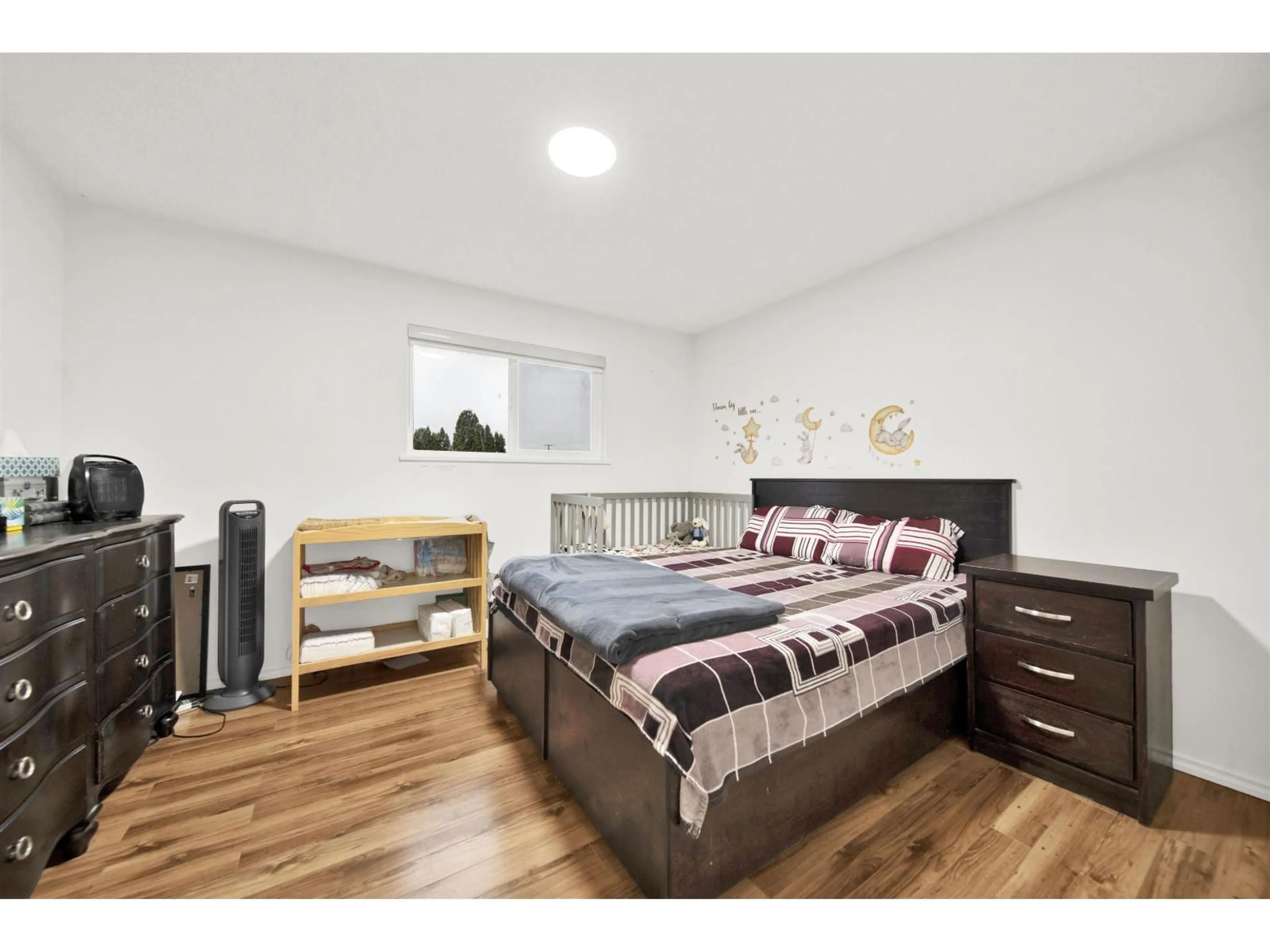 Bedroom with bed, wood/laminate floor for 6369 173A STREET, Surrey British Columbia V3S5J8