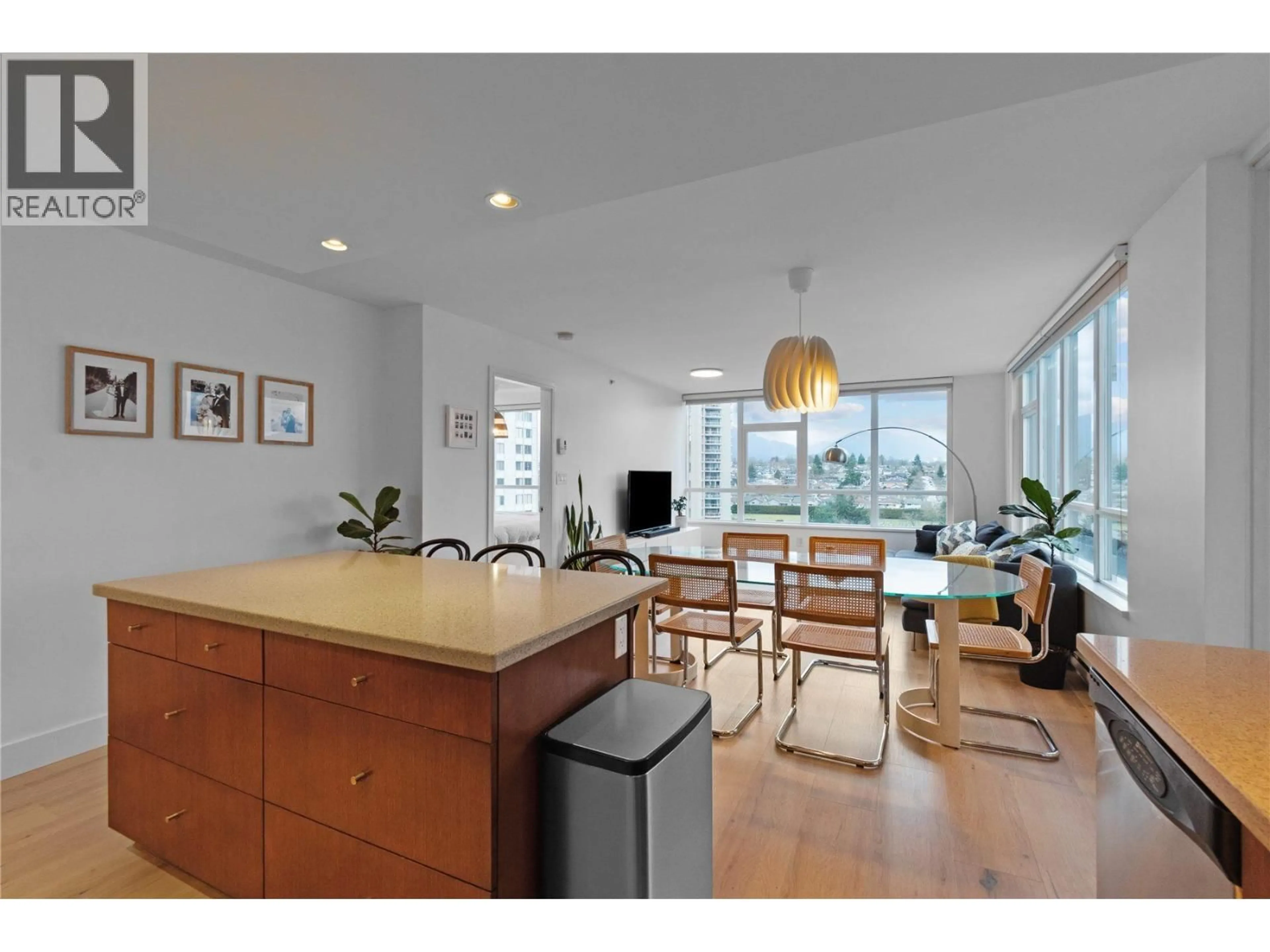 Open concept kitchen, wood/laminate floor for 1102 - 4400 BUCHANAN STREET, Burnaby British Columbia V5C0E3