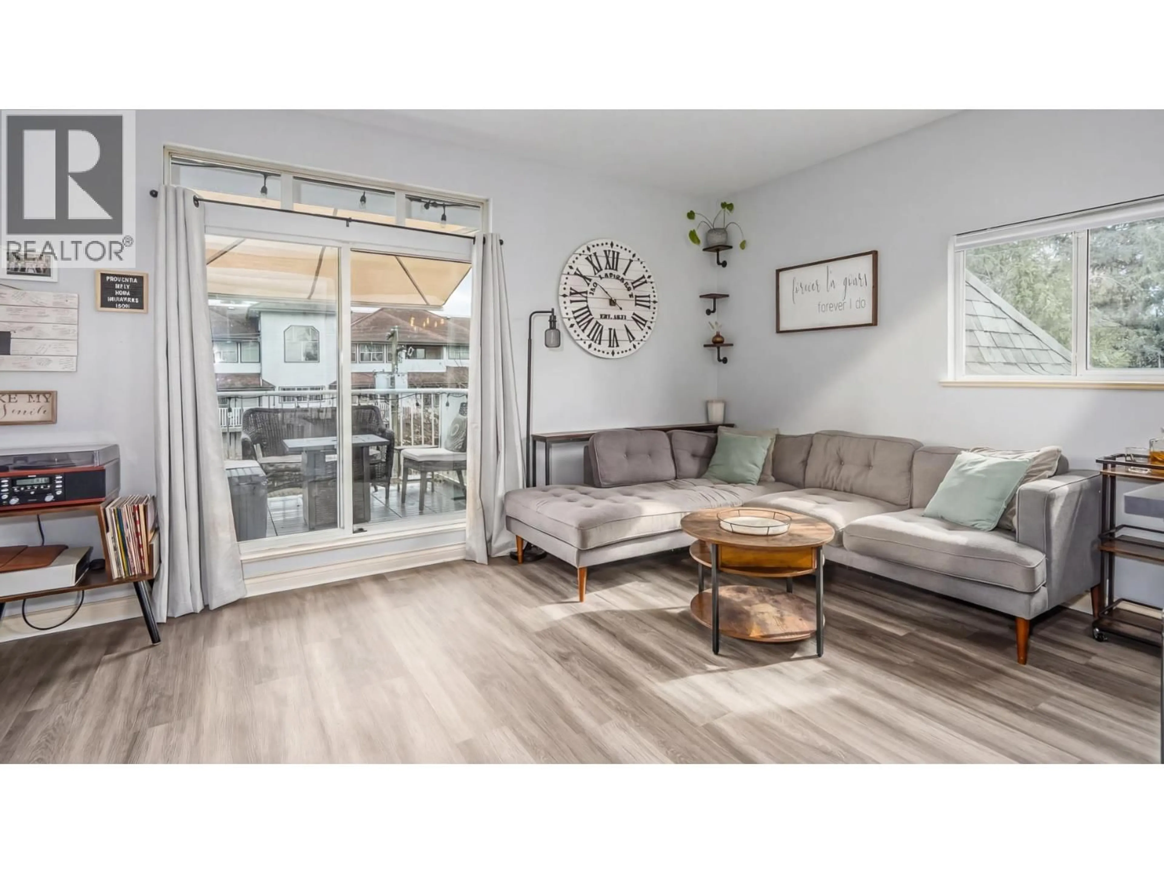 Living room with furniture, wood/laminate floor for 403 - 20556 113 AVENUE, Maple Ridge British Columbia V2X1Z3