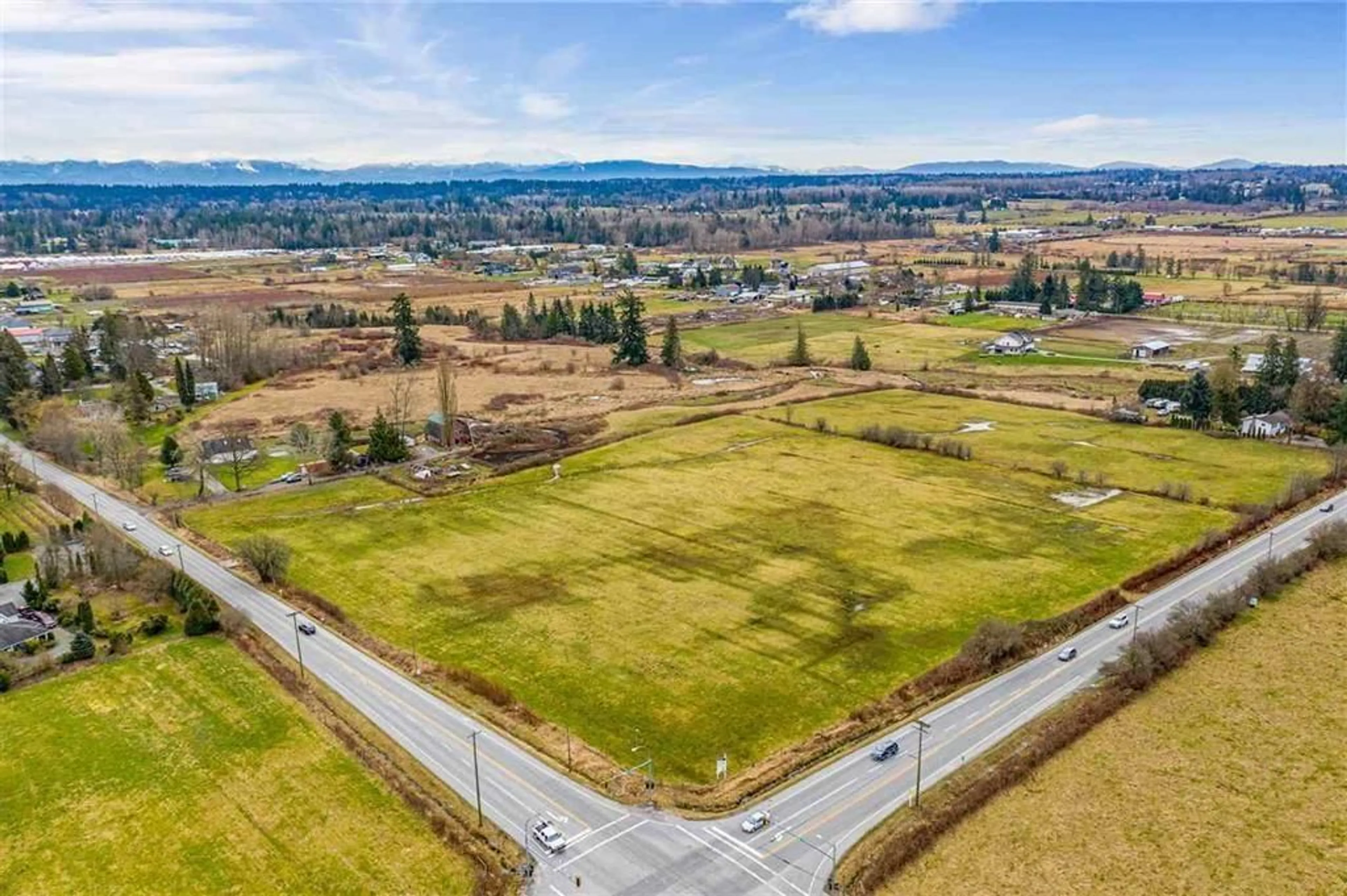 A pic from outside/outdoor area/front of a property/back of a property/a pic from drone, mountain view for 21780 64 AVENUE, Langley British Columbia V2Y2N7