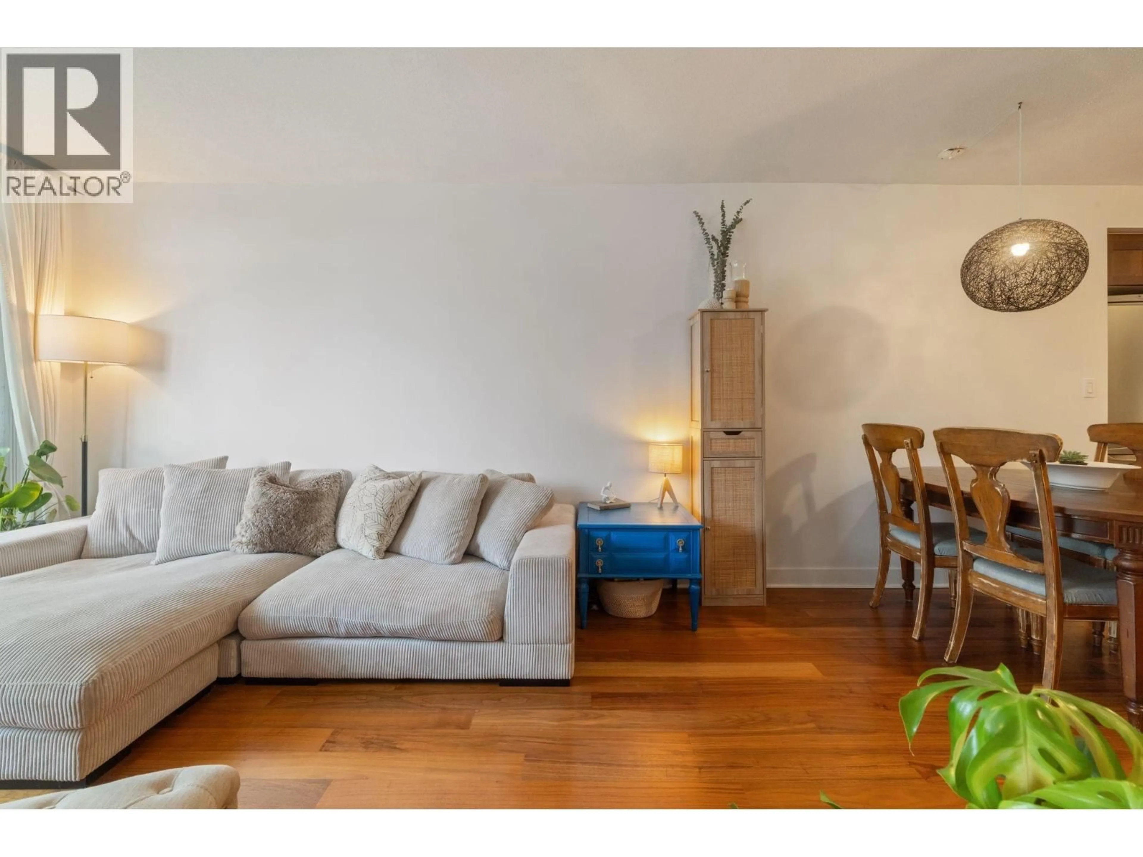 Living room with furniture, wood/laminate floor for 608 - 2228 BROADWAY, Vancouver British Columbia V6K0B1