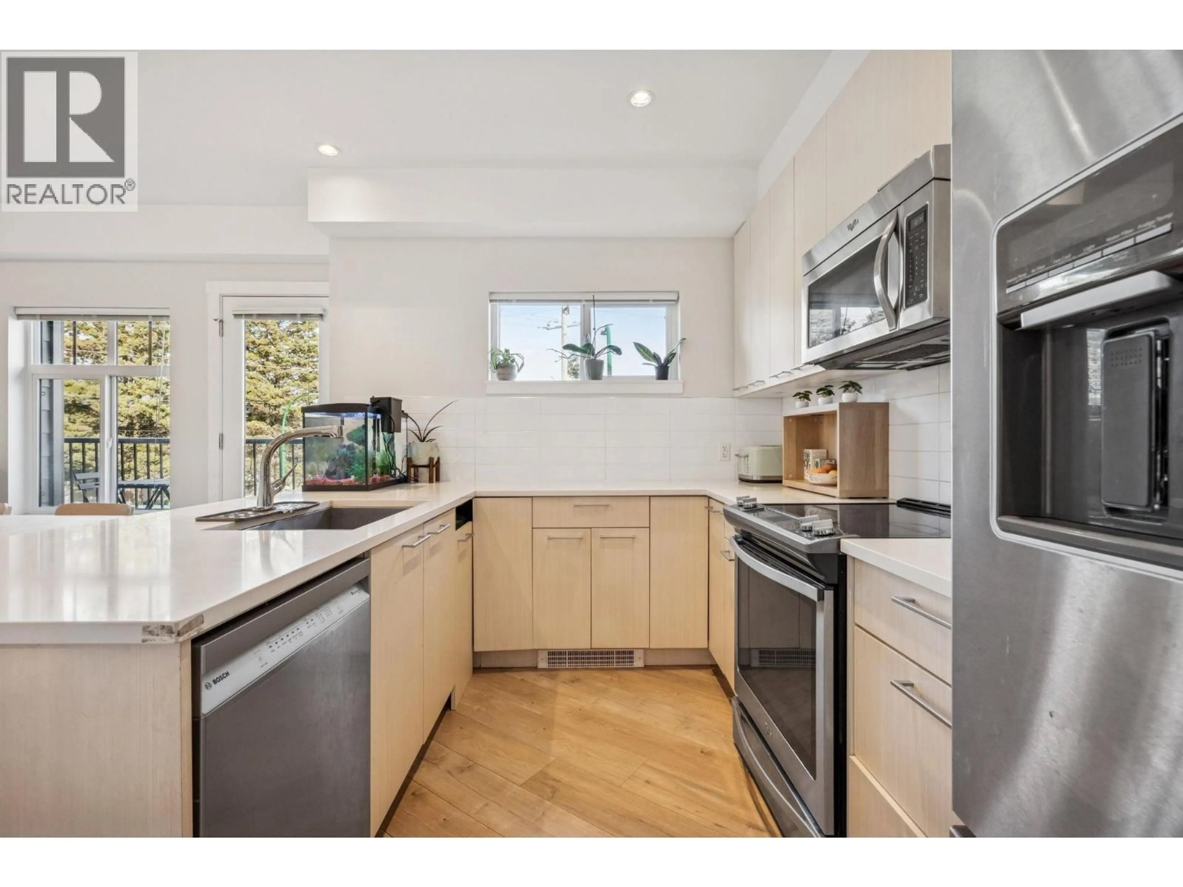 Open concept kitchen, unknown for 205 - 7180 BARNET ROAD, Burnaby British Columbia V5A1C8