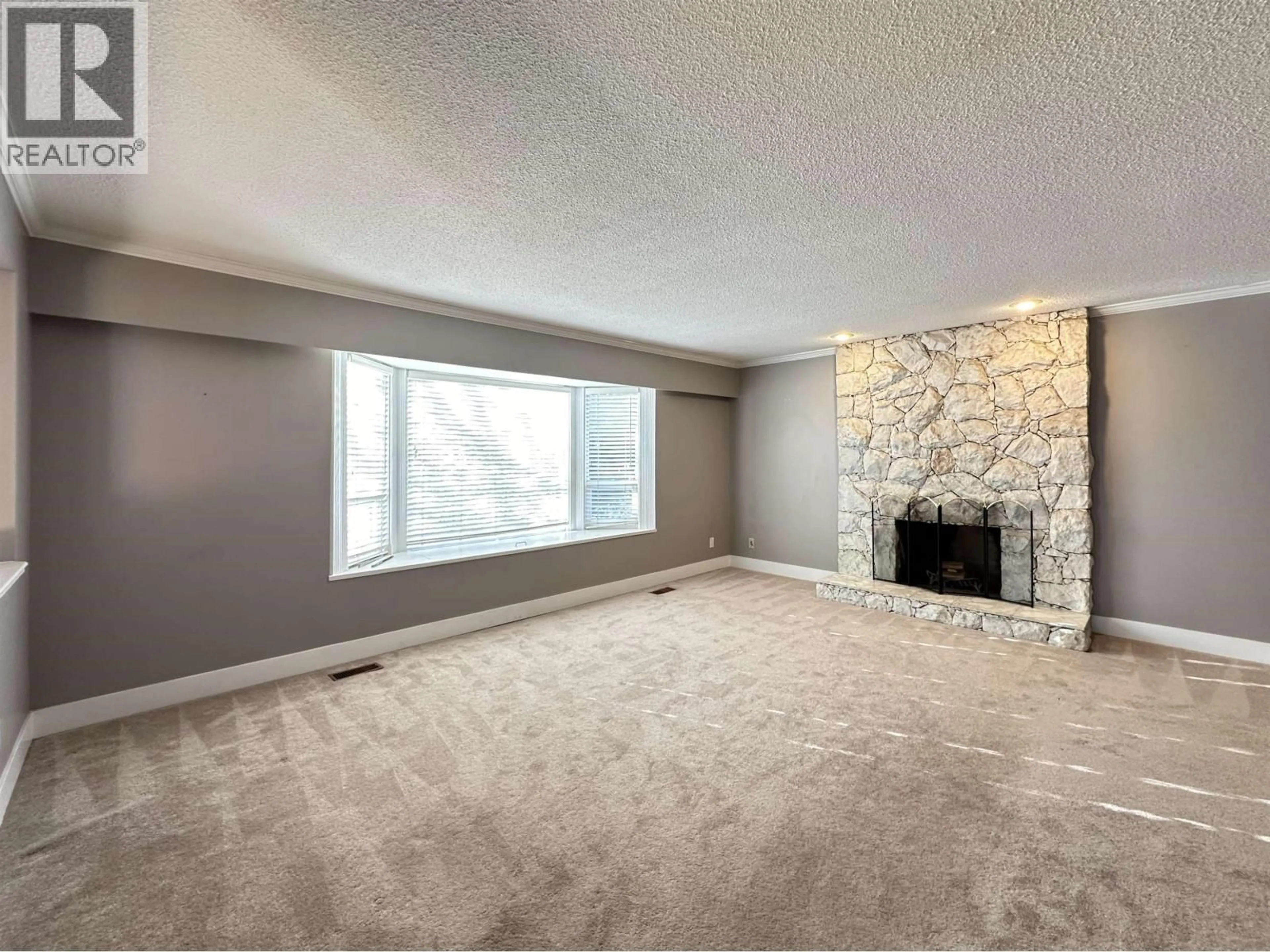 Living room with furniture, carpet floor for 5165 7B AVENUE, Delta British Columbia V4M1S3