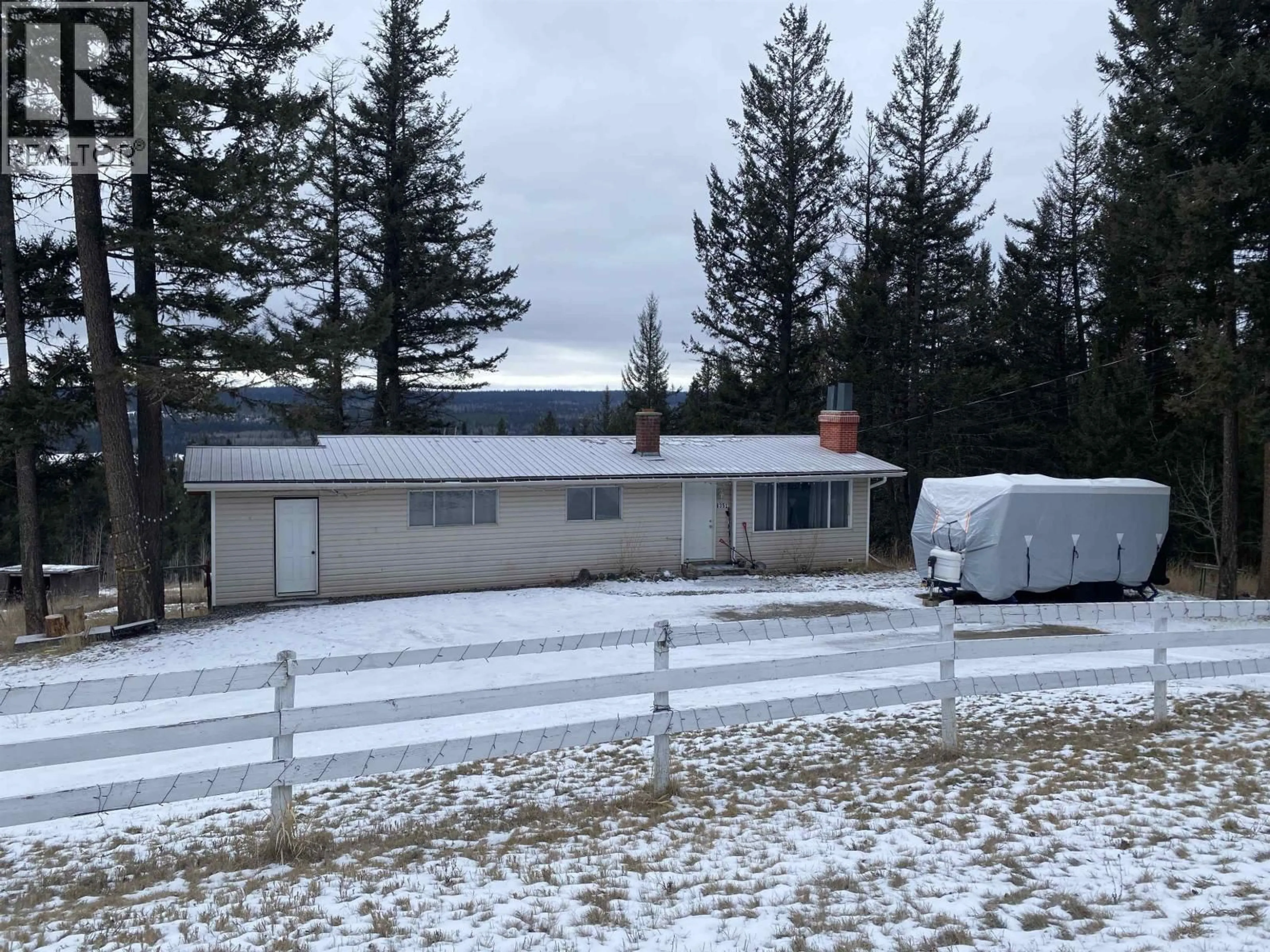 A pic from outside/outdoor area/front of a property/back of a property/a pic from drone, mountain view for 6351 HIGHLAND CRESCENT, 100 Mile House British Columbia V0K2E3