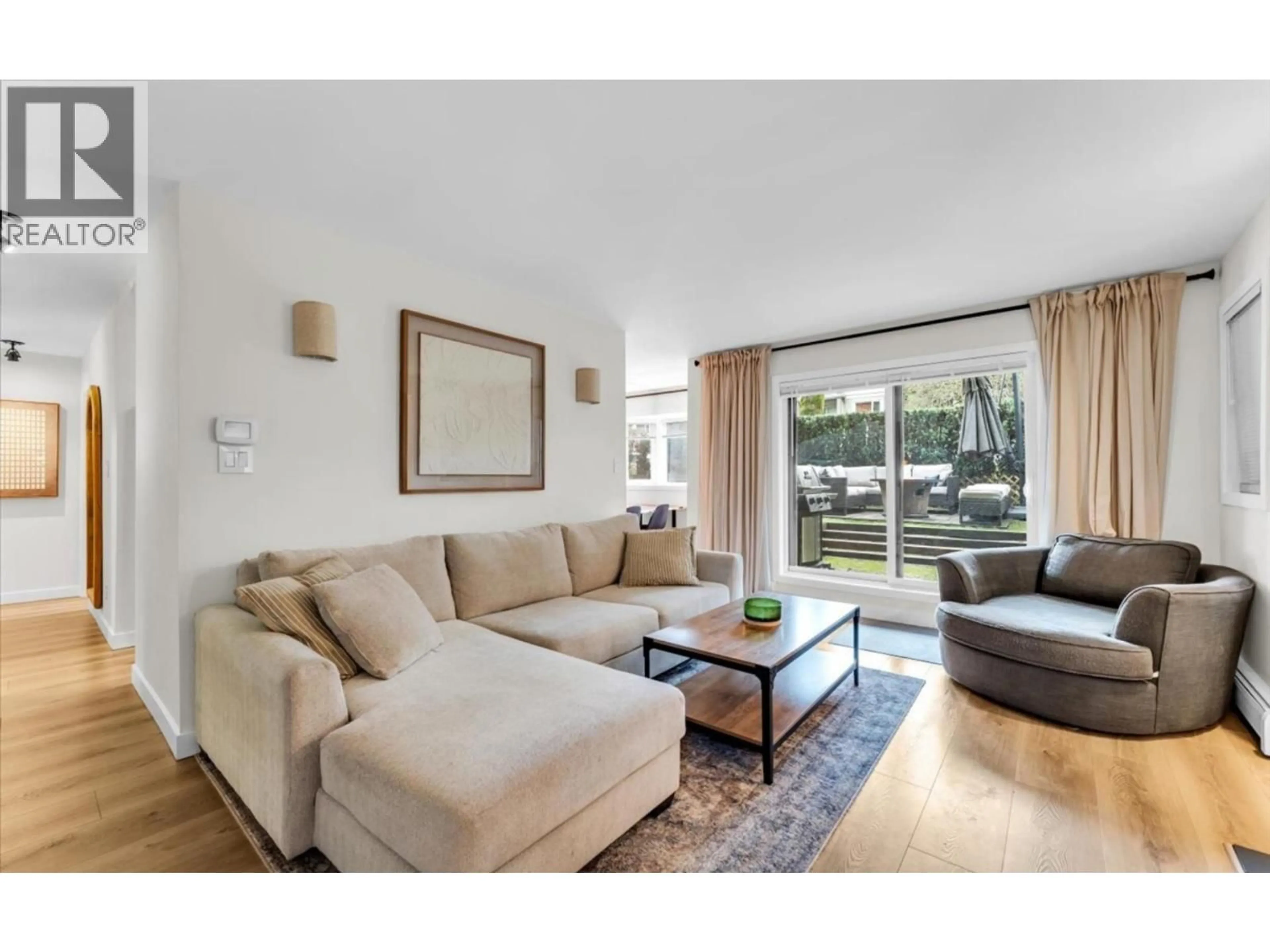 Living room with furniture, unknown for 102 - 1935 1ST AVENUE, Vancouver British Columbia V6J1G7