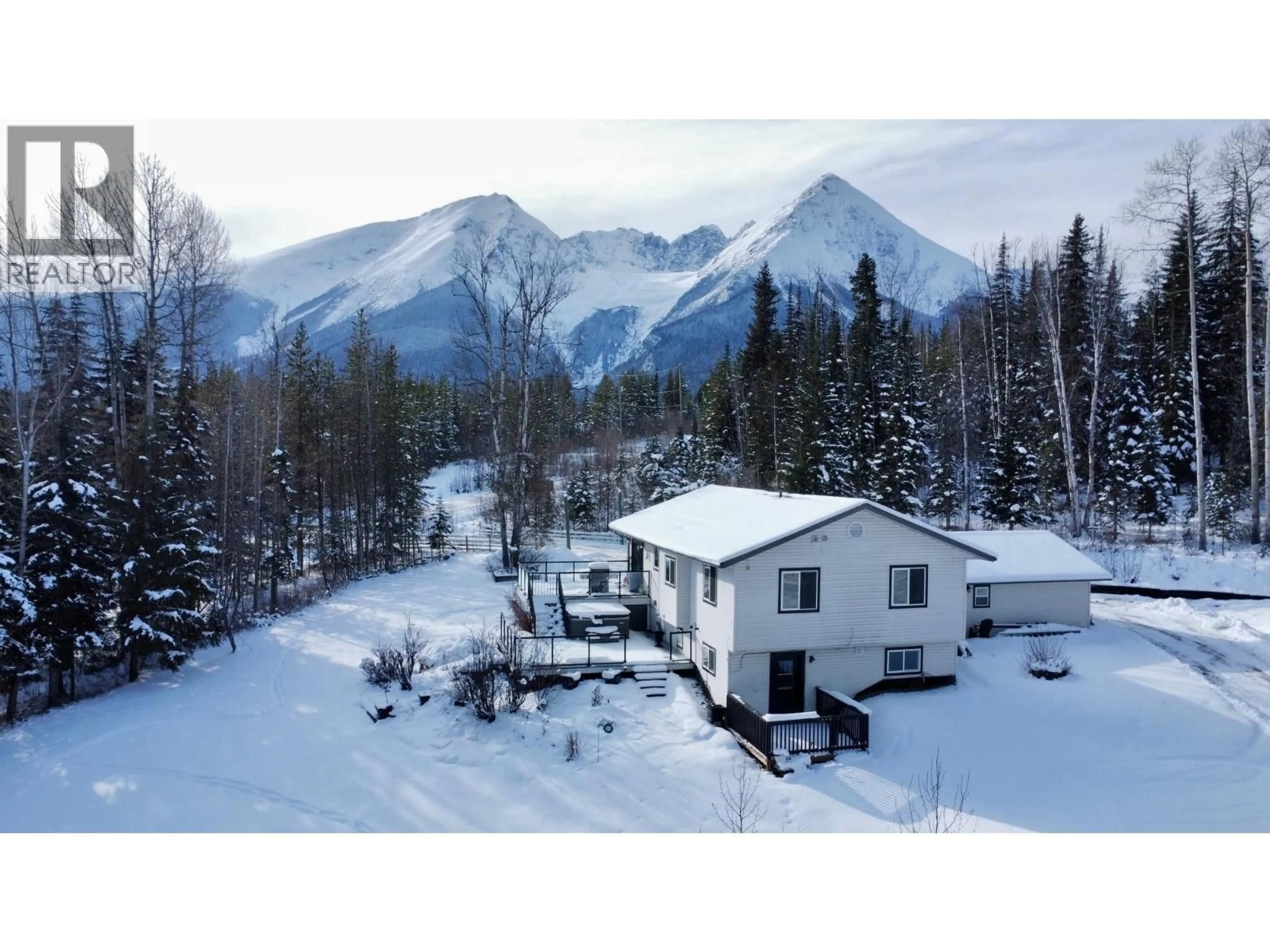A pic from outside/outdoor area/front of a property/back of a property/a pic from drone, mountain view for 9670 HORLINGS ROAD, Smithers British Columbia V0J2N2