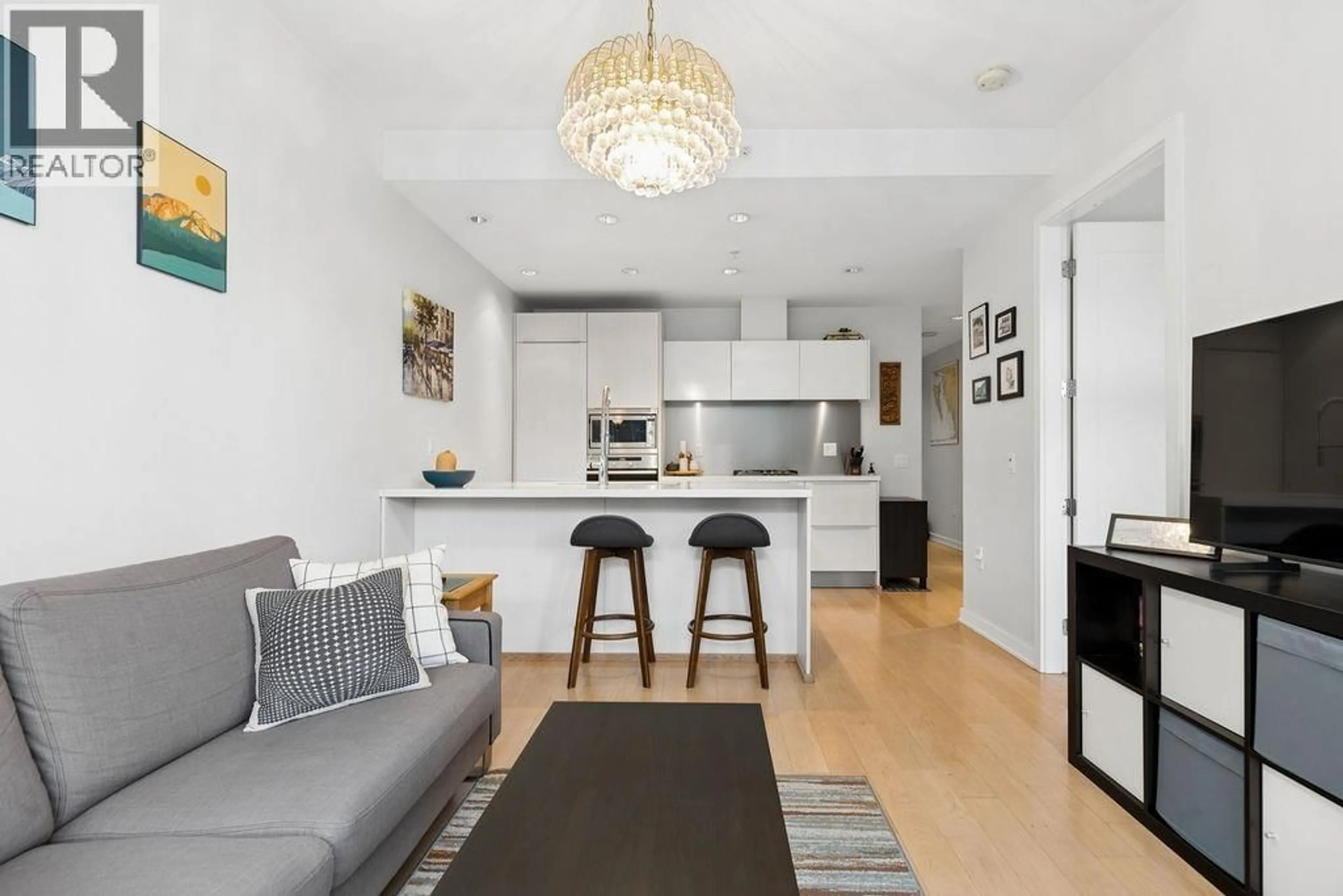 Open concept kitchen, wood/laminate floor for 403 - 181 1ST AVENUE, Vancouver British Columbia V5Y0E3