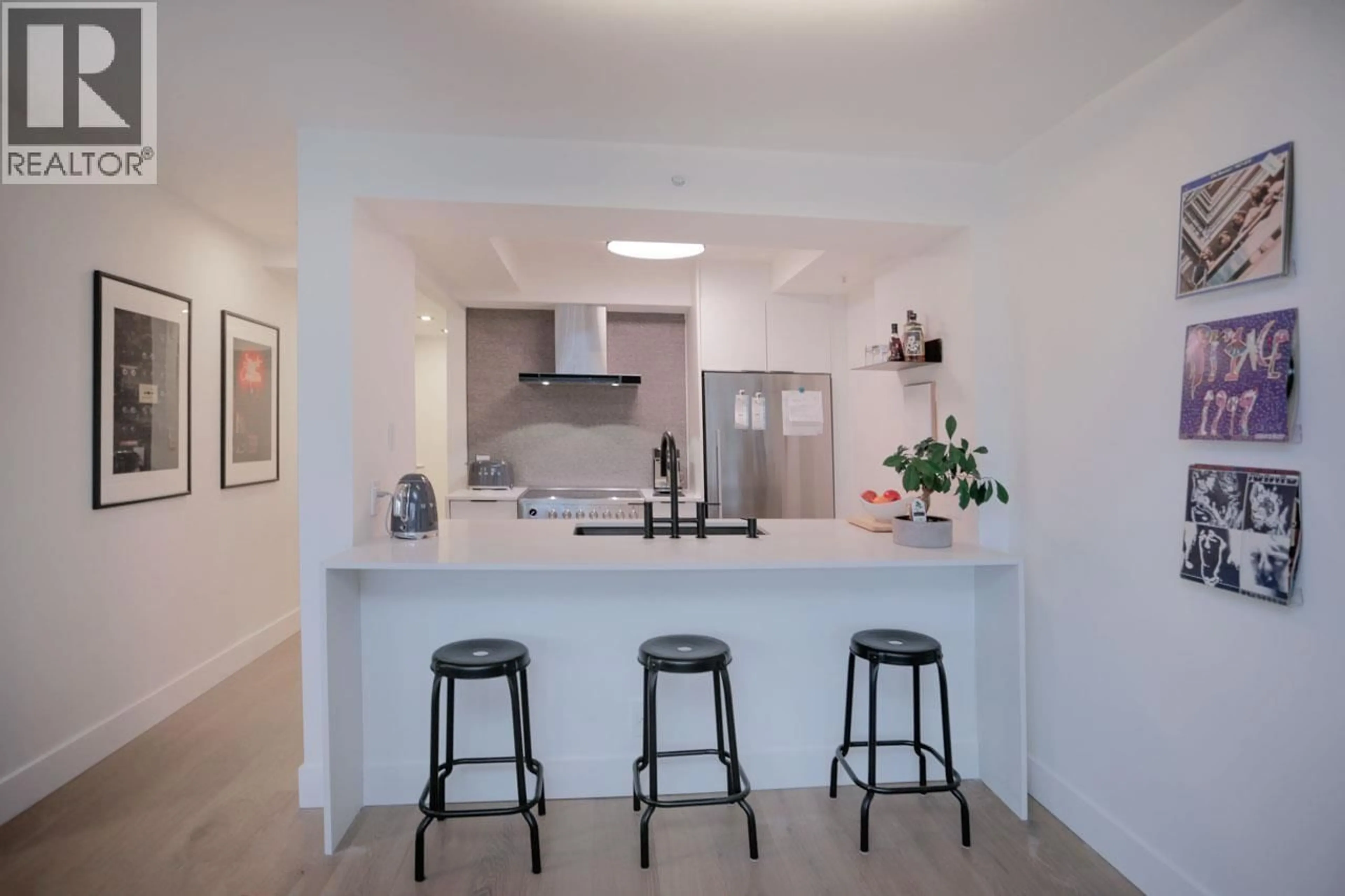 Open concept kitchen, ceramic/tile floor for 703 - 1288 ALBERNI STREET, Vancouver British Columbia V6E4N5