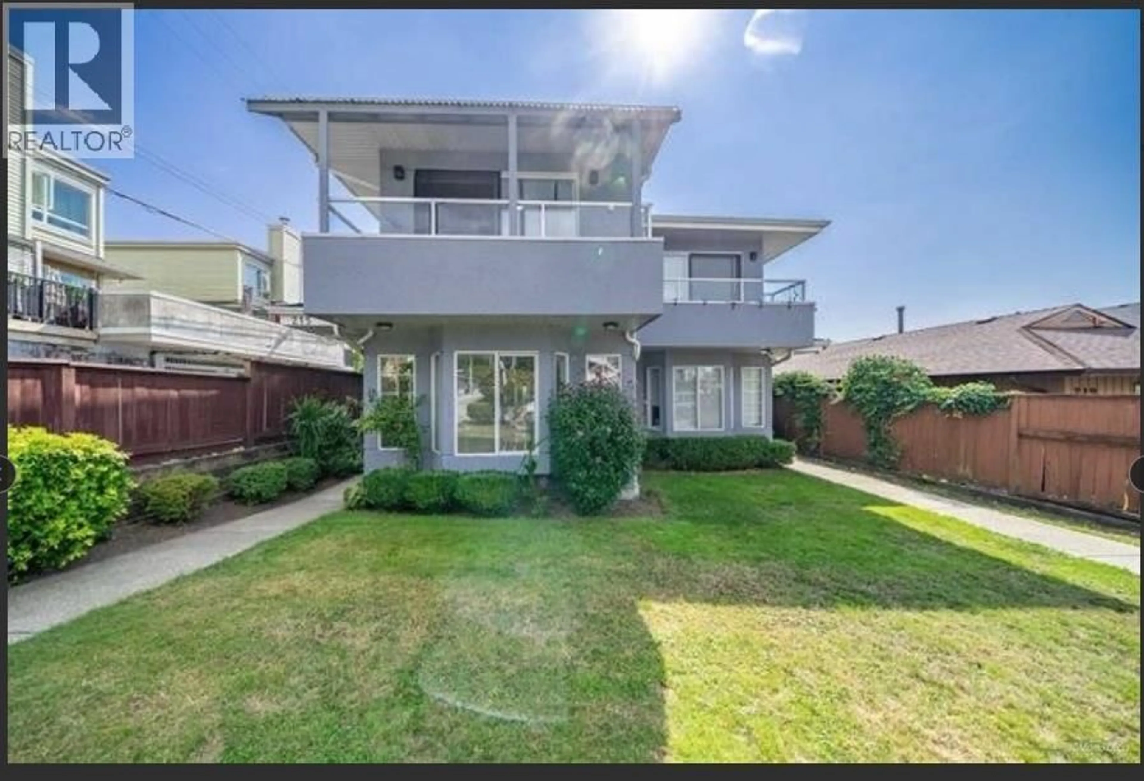 A pic from outside/outdoor area/front of a property/back of a property/a pic from drone, street for 215 18TH STREET, North Vancouver British Columbia V7M1W7