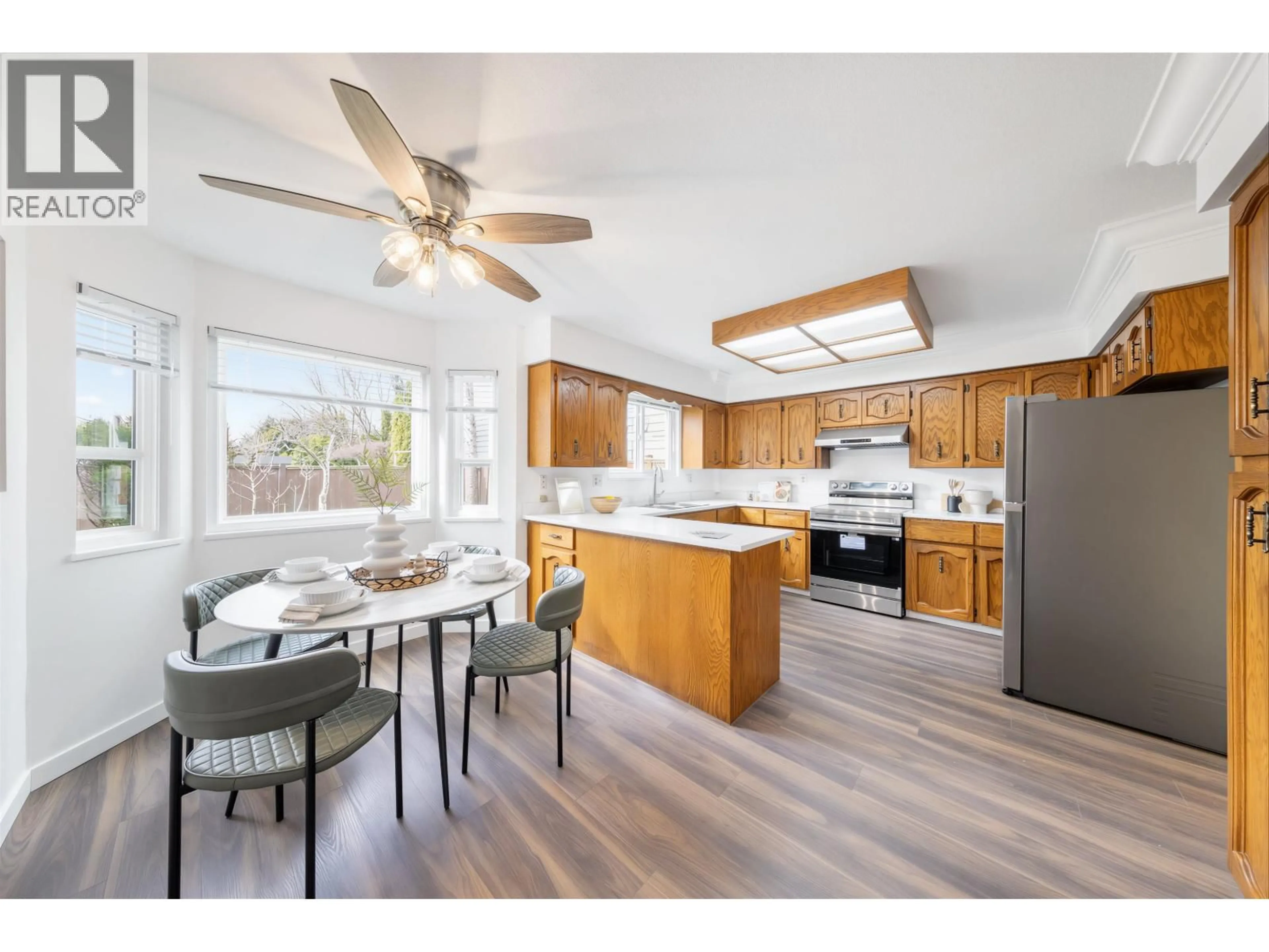 Open concept kitchen, wood/laminate floor for 8691 DOULTON PLACE, Richmond British Columbia V7C5A3