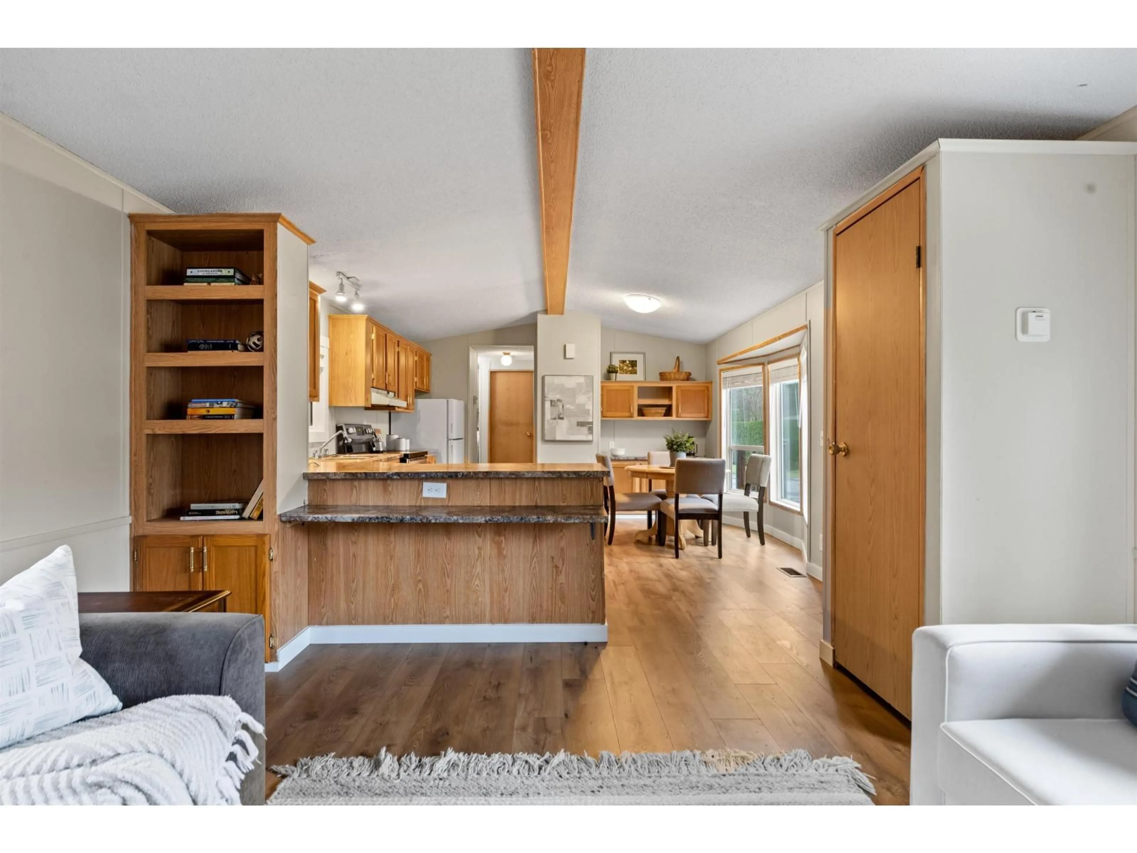 Open concept kitchen, wood/laminate floor for 216 - 45835 SLEEPY HOLLOW ROAD, Cultus Lake British Columbia V2R5A7