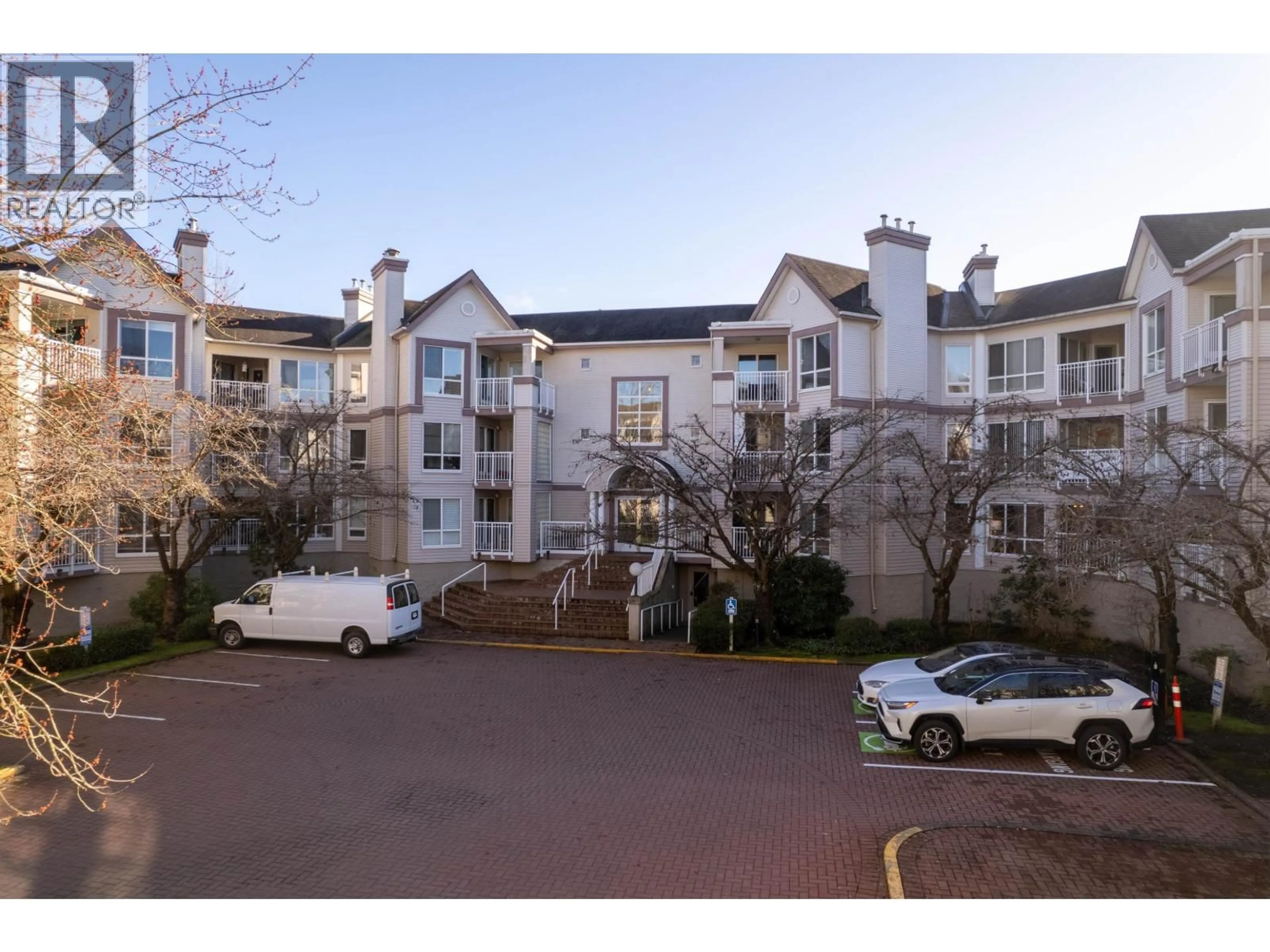 A pic from outside/outdoor area/front of a property/back of a property/a pic from drone, mountain view for 321 - 7453 MOFFATT ROAD, Richmond British Columbia V6Y1X9