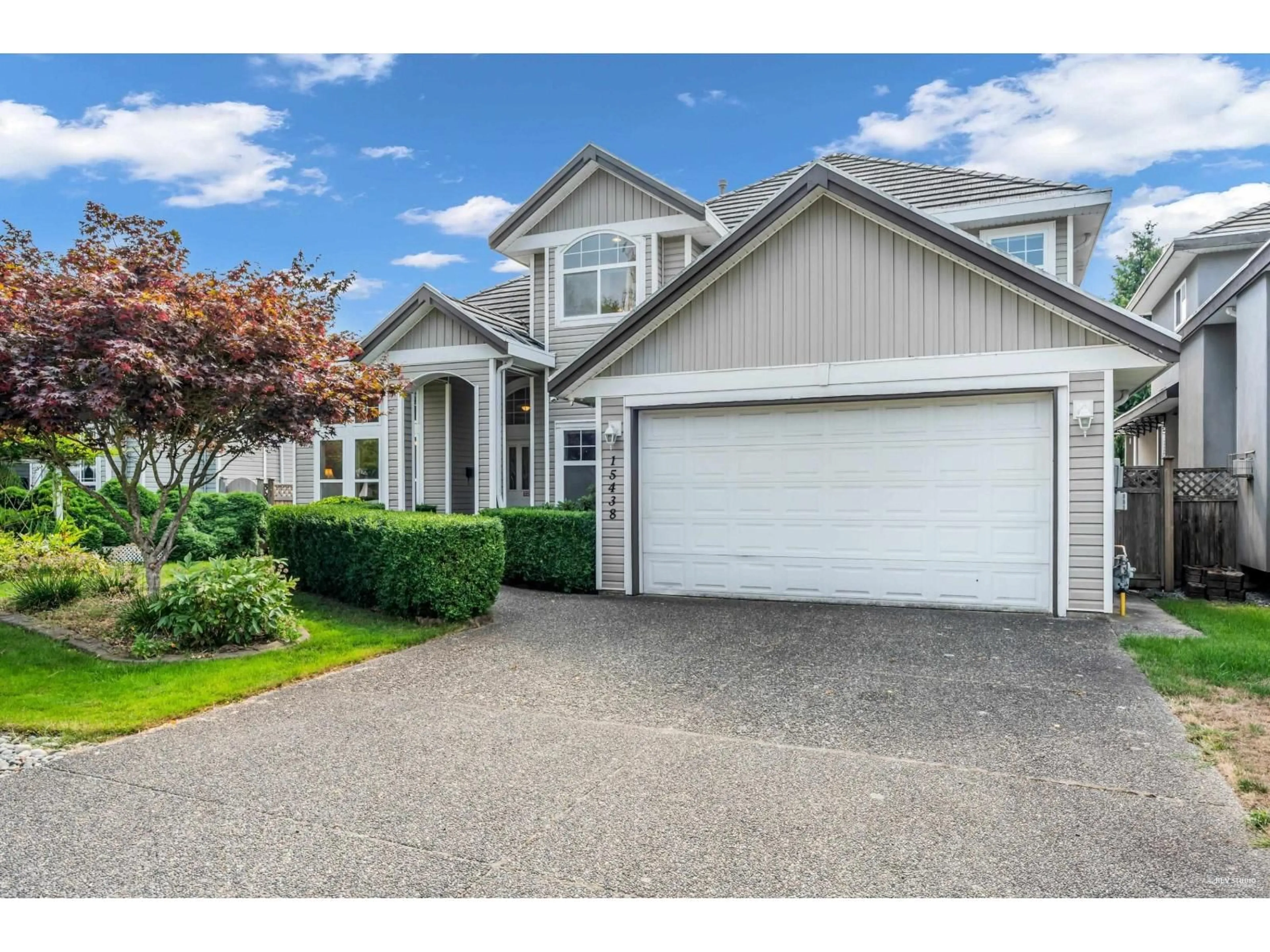 Home with vinyl exterior material, street for 15438 112 AVENUE, Surrey British Columbia V3R6H1