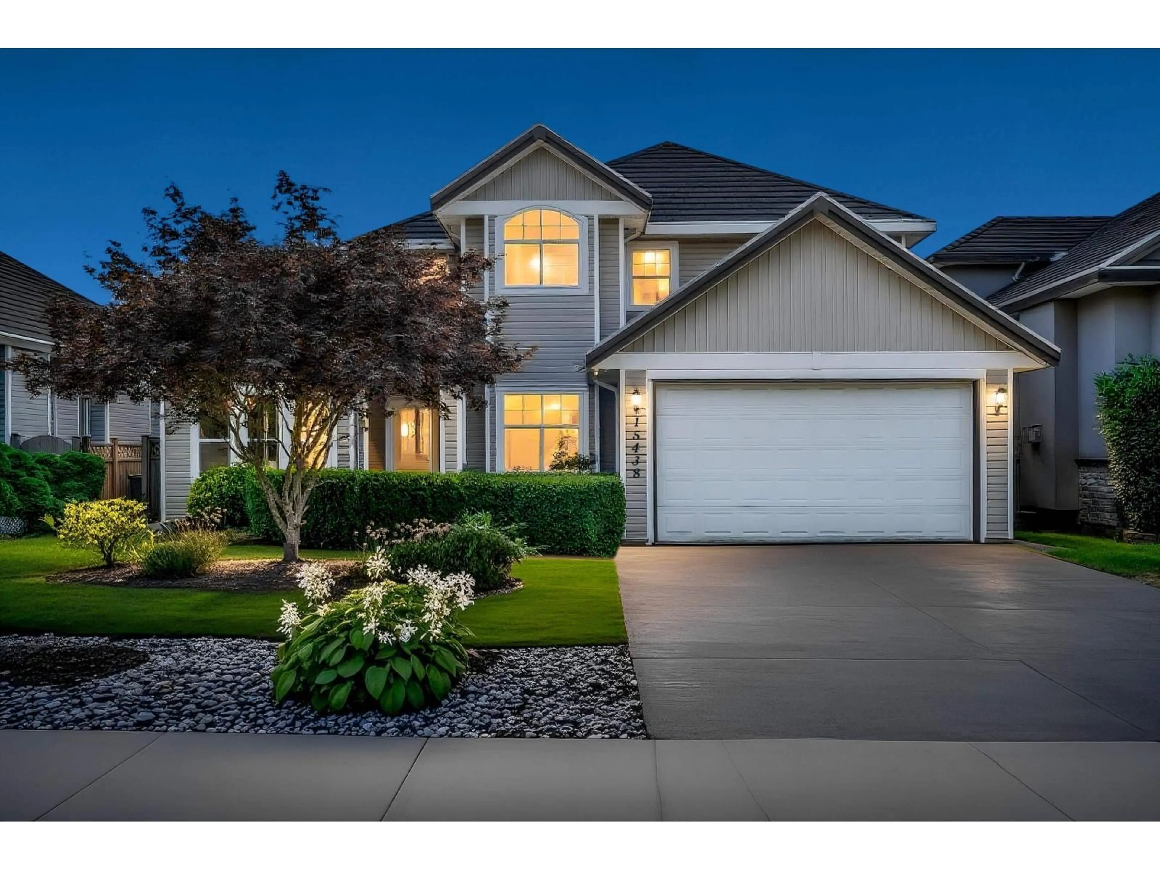 Home with vinyl exterior material, street for 15438 112 AVENUE, Surrey British Columbia V3R6H1