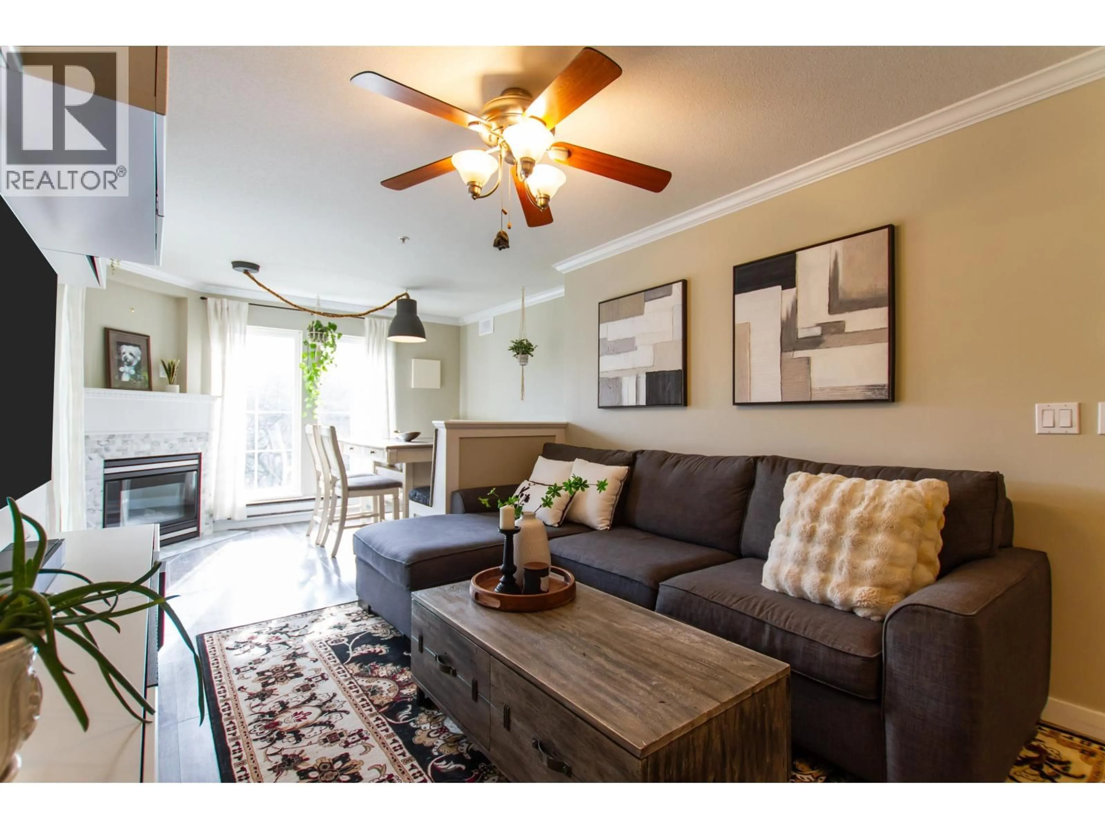 Living room with furniture, wood/laminate floor for 202 - 1669 GRANT AVENUE, Port Coquitlam British Columbia V3B7W9