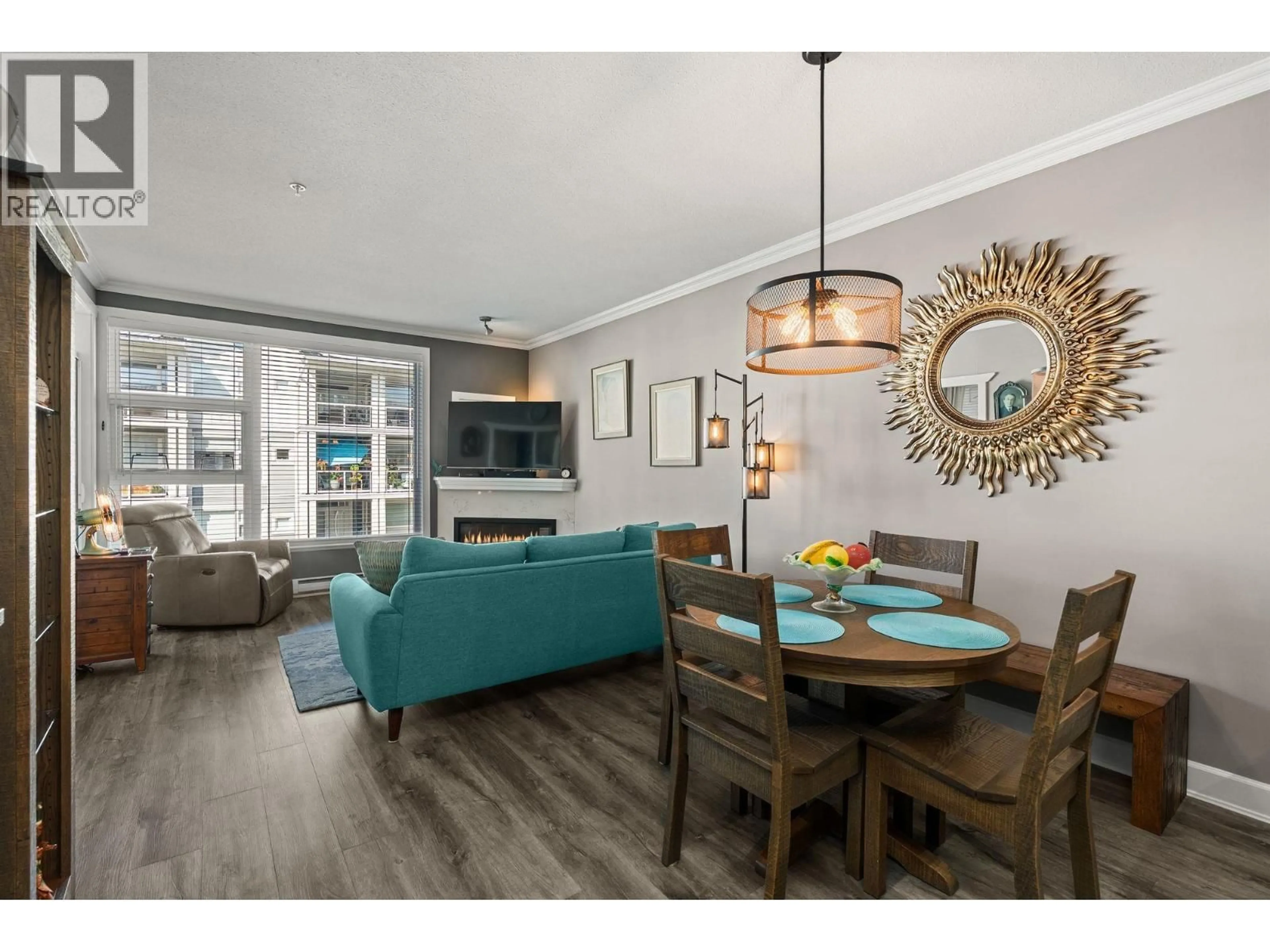 Living room with furniture, wood/laminate floor for 315 - 4600 WESTWATER DRIVE, Richmond British Columbia V7E6S2