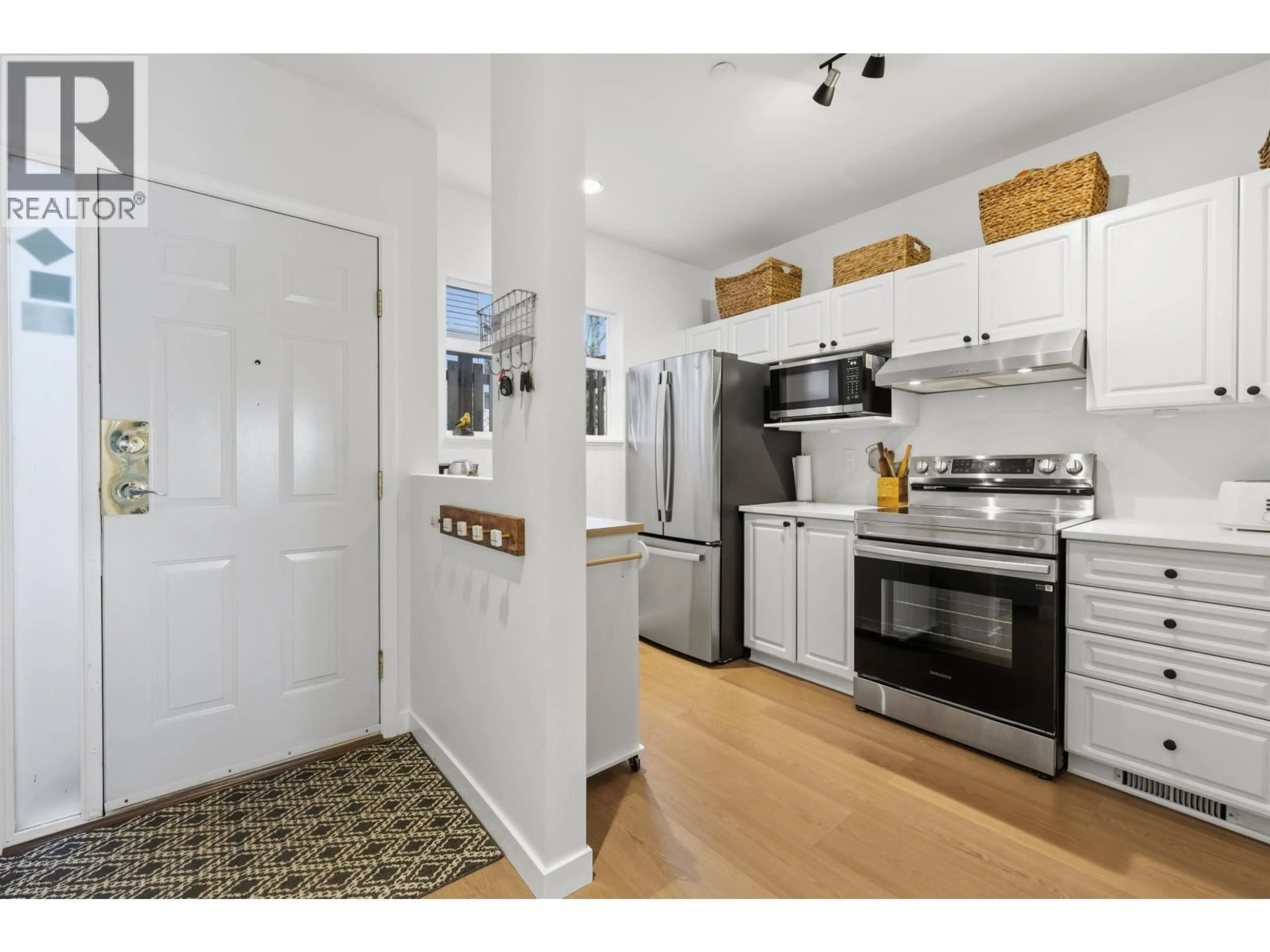 Open concept kitchen, unknown for 1 - 8581 JELLICOE STREET, Vancouver British Columbia V5S4T5