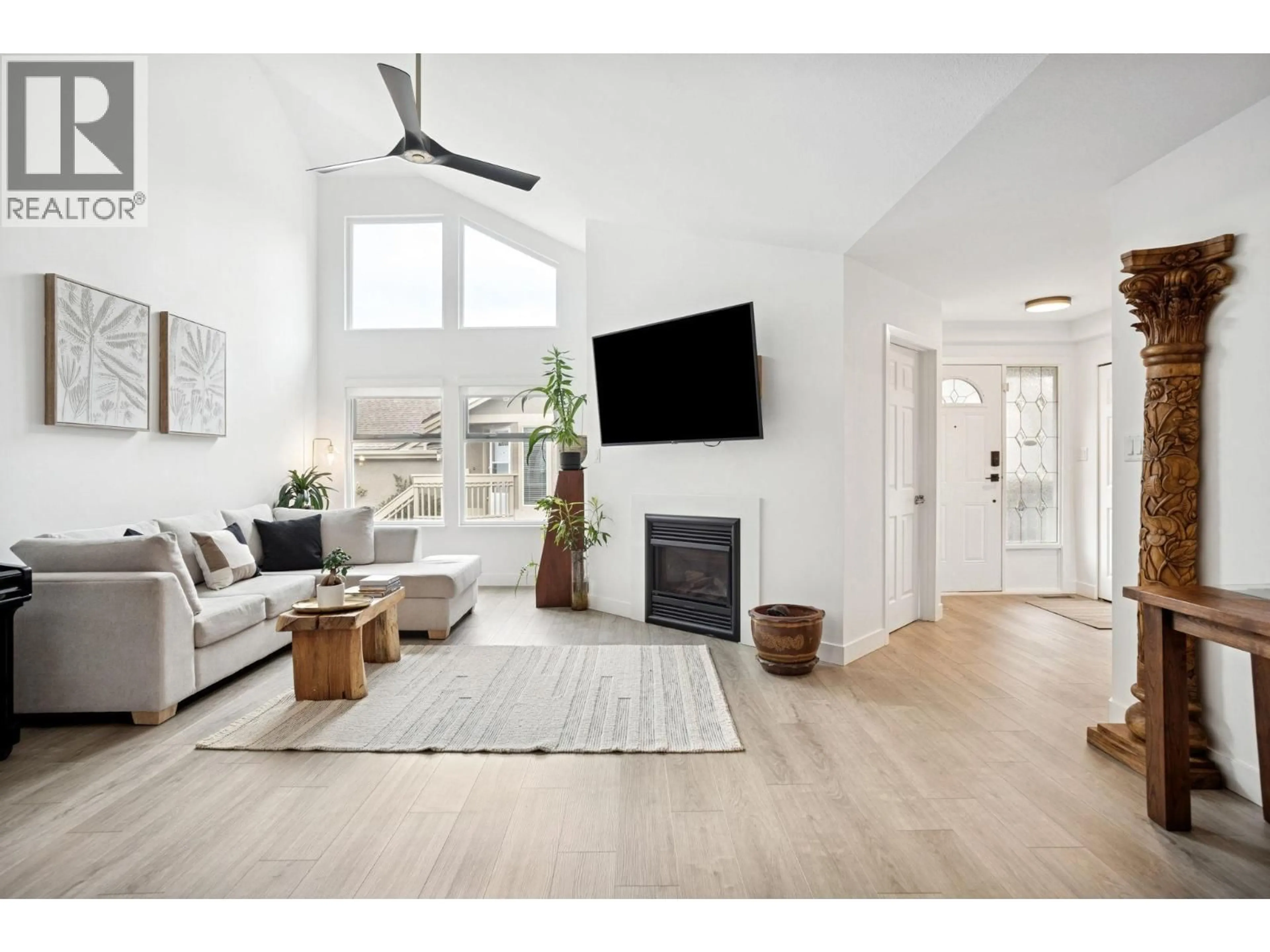 Living room with furniture, wood/laminate floor for 31 - 12880 RAILWAY AVENUE, Richmond British Columbia V7E6G4