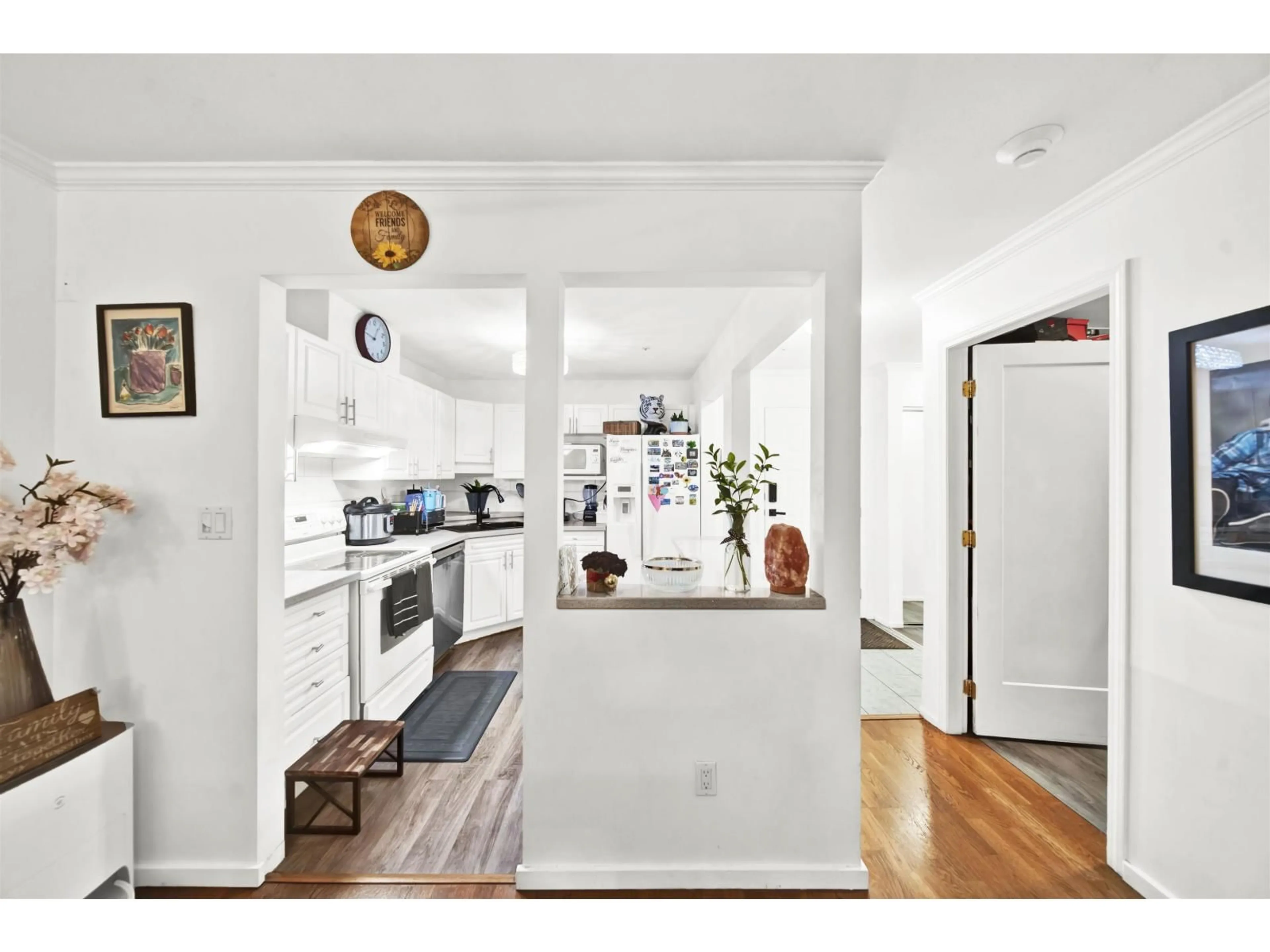 Open concept kitchen, wood/laminate floor for 215 - 9626 148 STREET, Surrey British Columbia V3R0W2