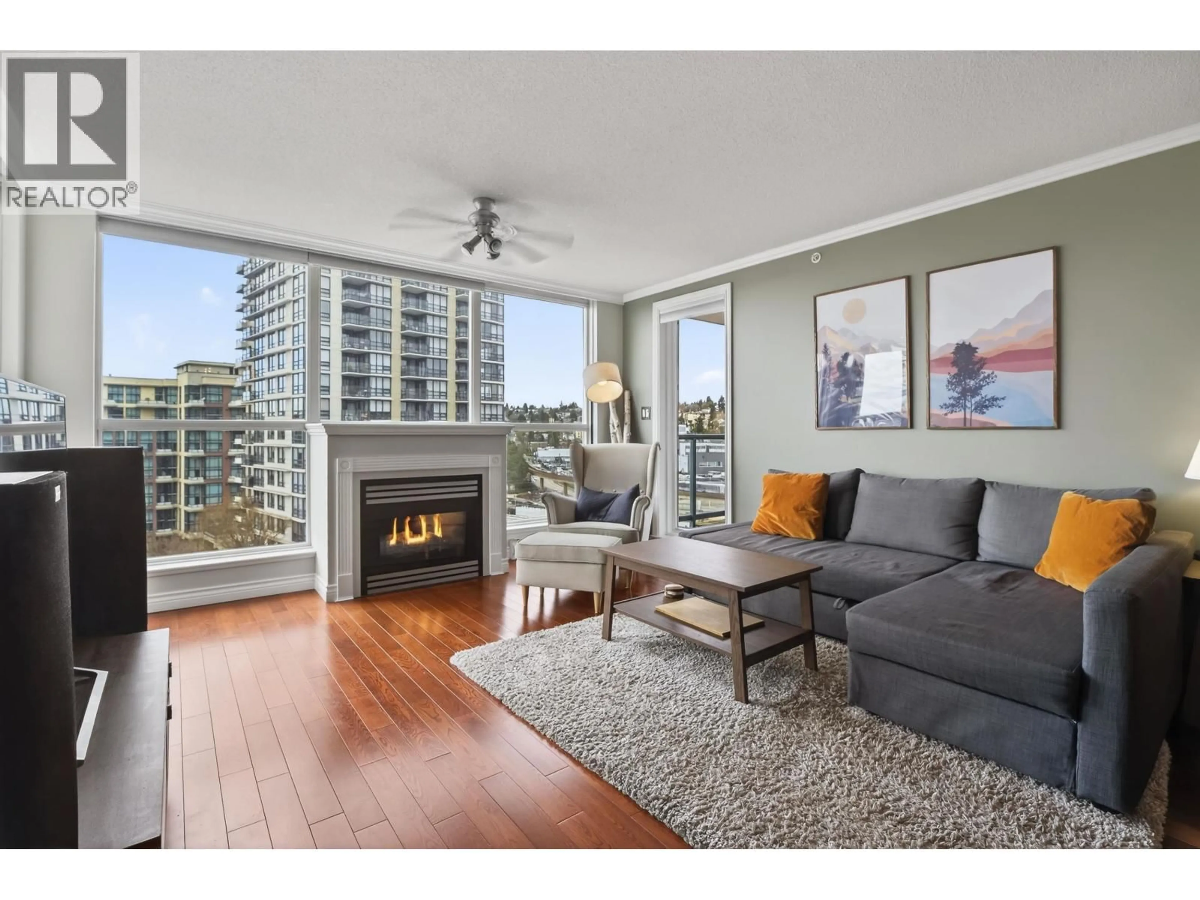 Living room with furniture, wood/laminate floor for 1007 - 10 LAGUNA COURT, New Westminster British Columbia V3M6W3