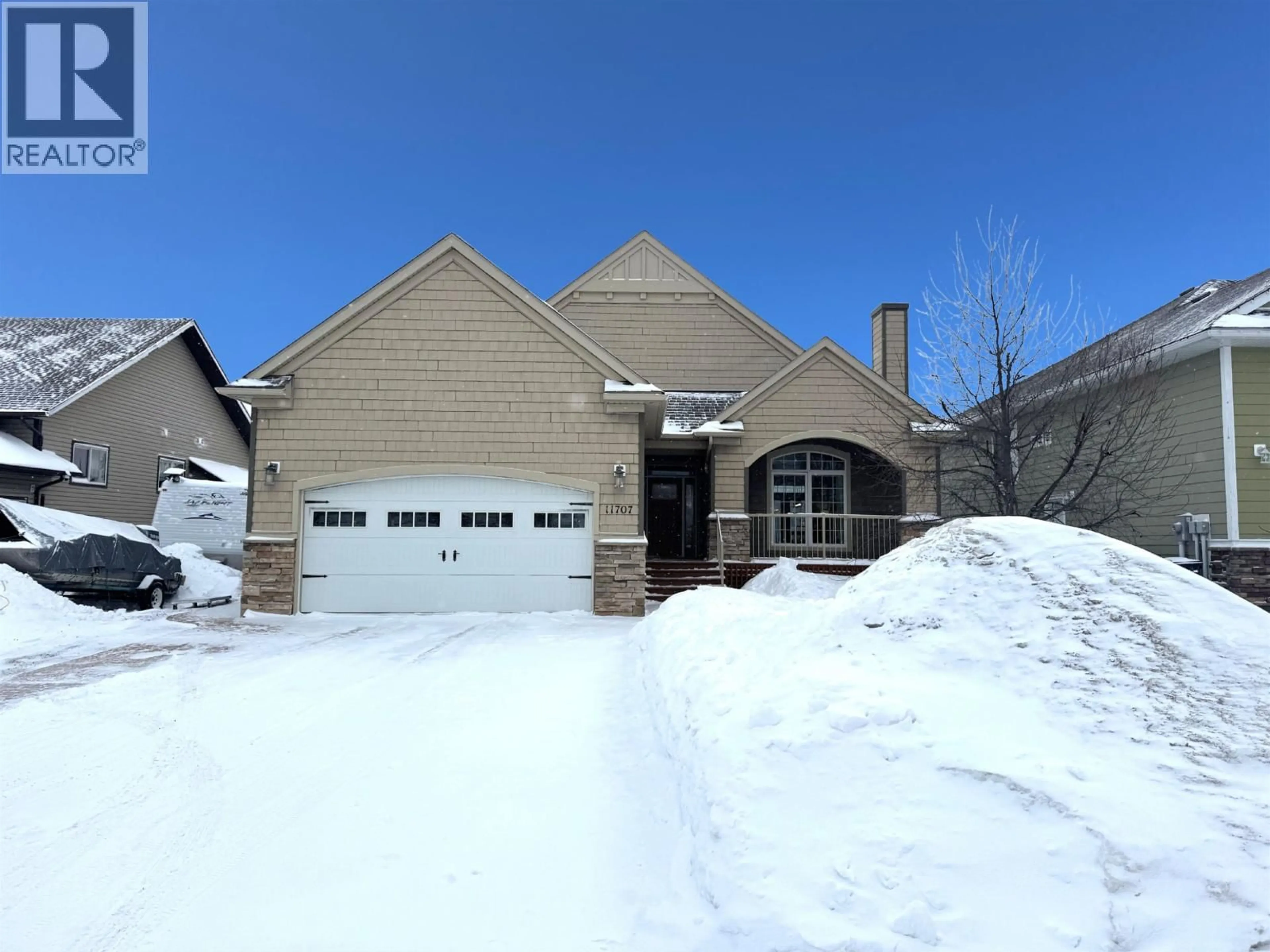 Home with brick exterior material, street for 11707 96A STREET, Fort St. John British Columbia V1J0E9