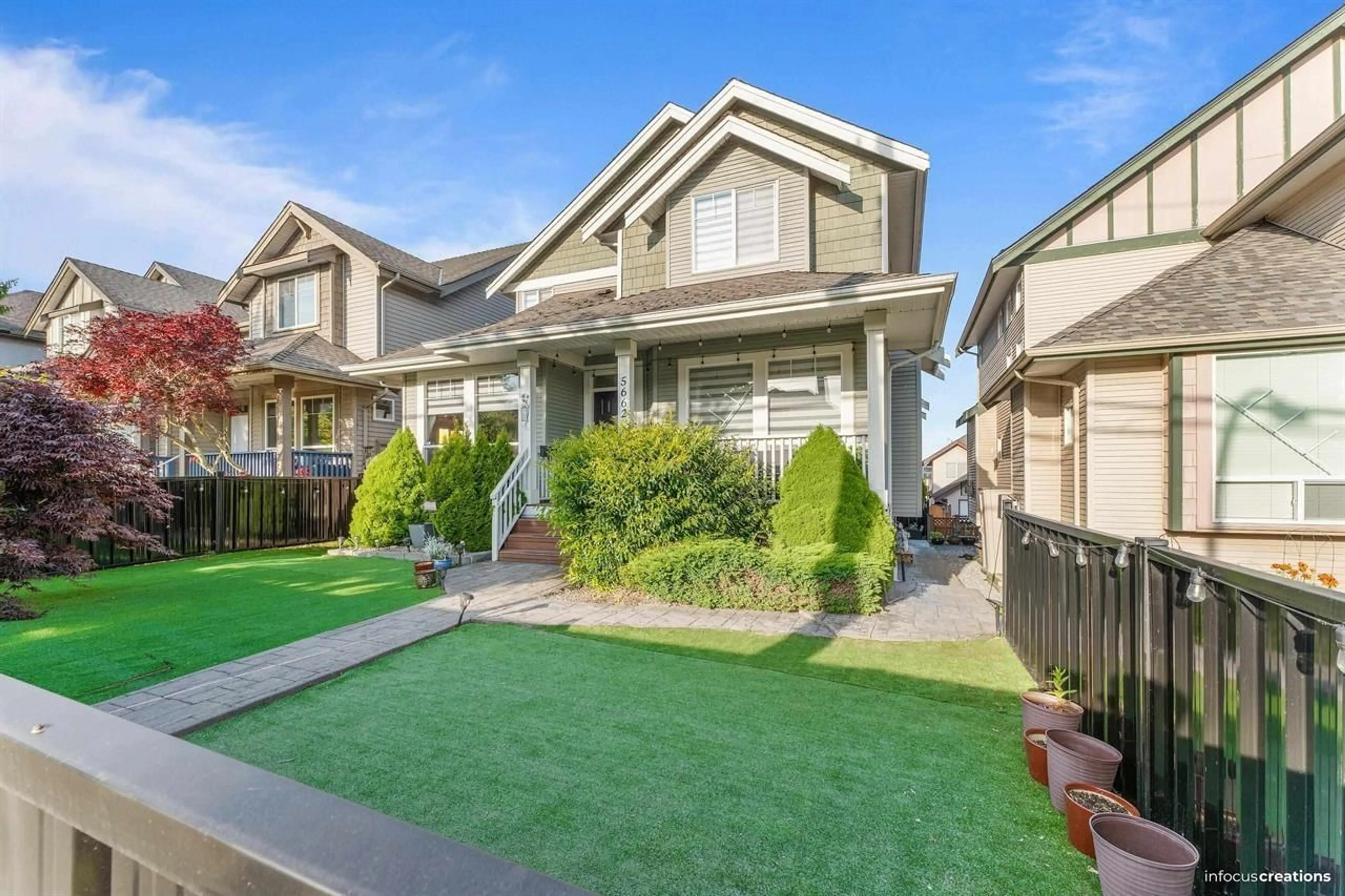 Home with vinyl exterior material, street for 5662 148 STREET, Surrey British Columbia V3S0X4