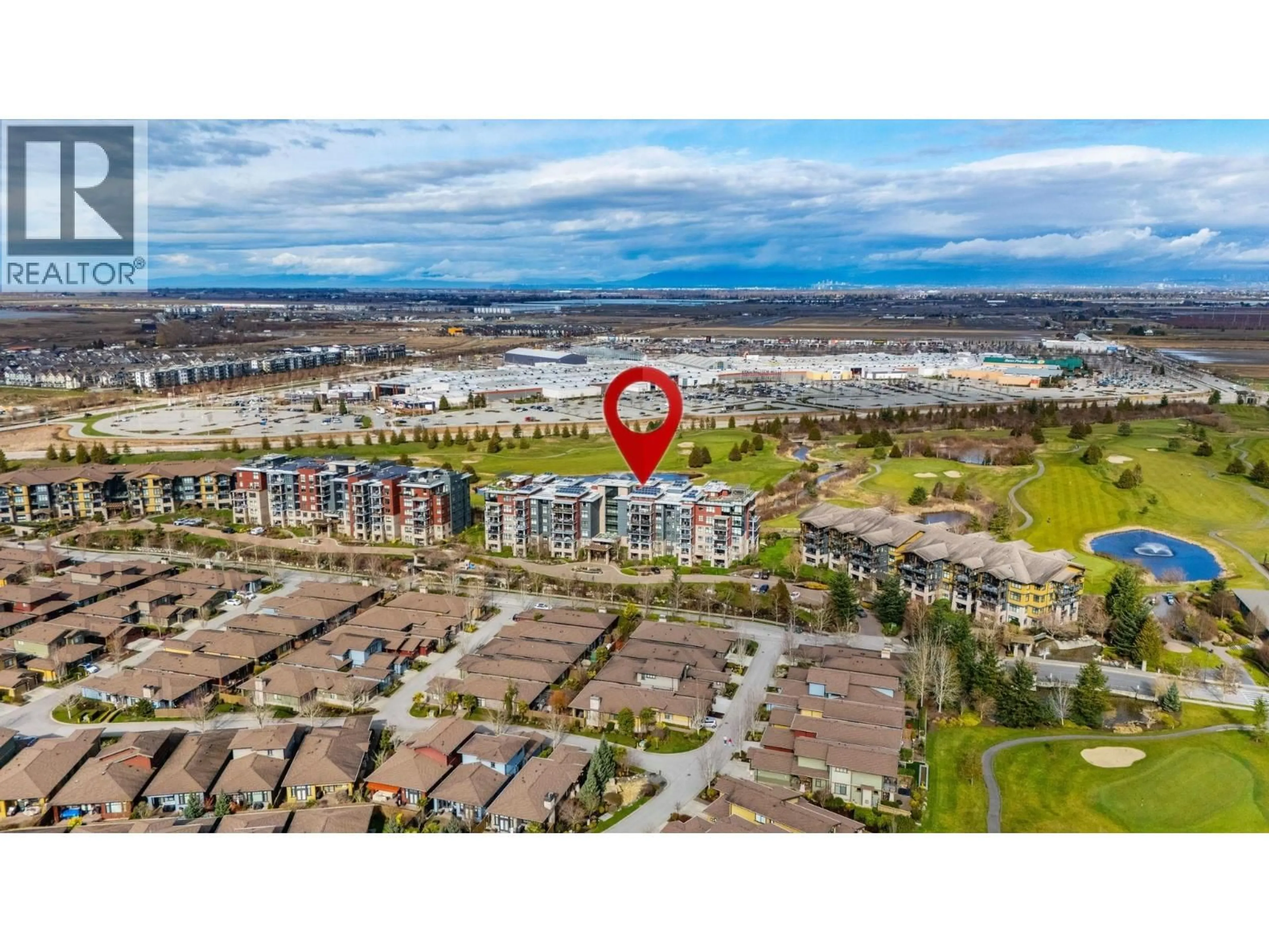 A pic from outside/outdoor area/front of a property/back of a property/a pic from drone, water/lake/river/ocean view for 211 - 5055 SPRINGS BOULEVARD, Delta British Columbia V4M0A5
