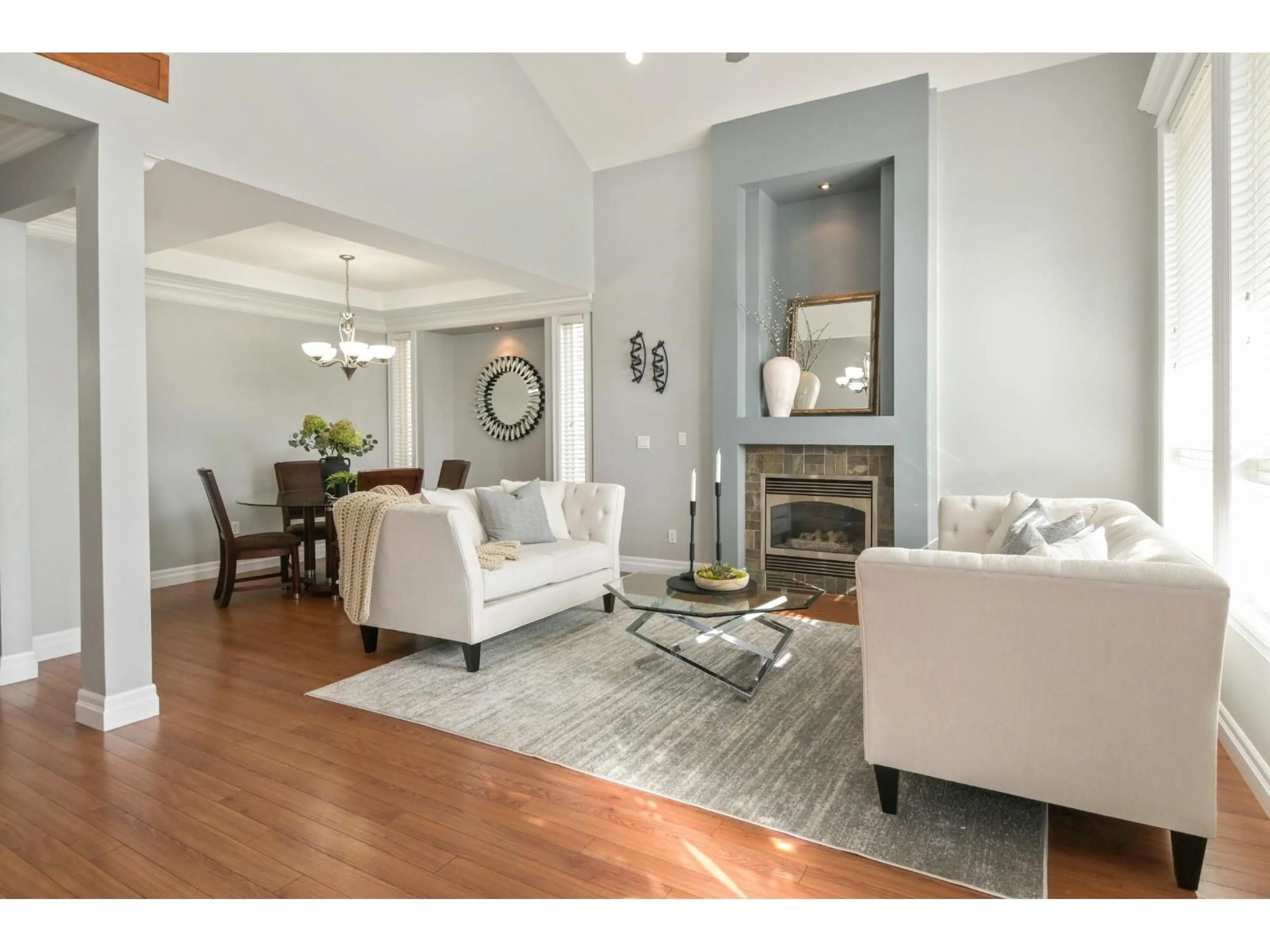 Living room with furniture, wood/laminate floor for 6351 167B STREET, Surrey British Columbia V3S1X3