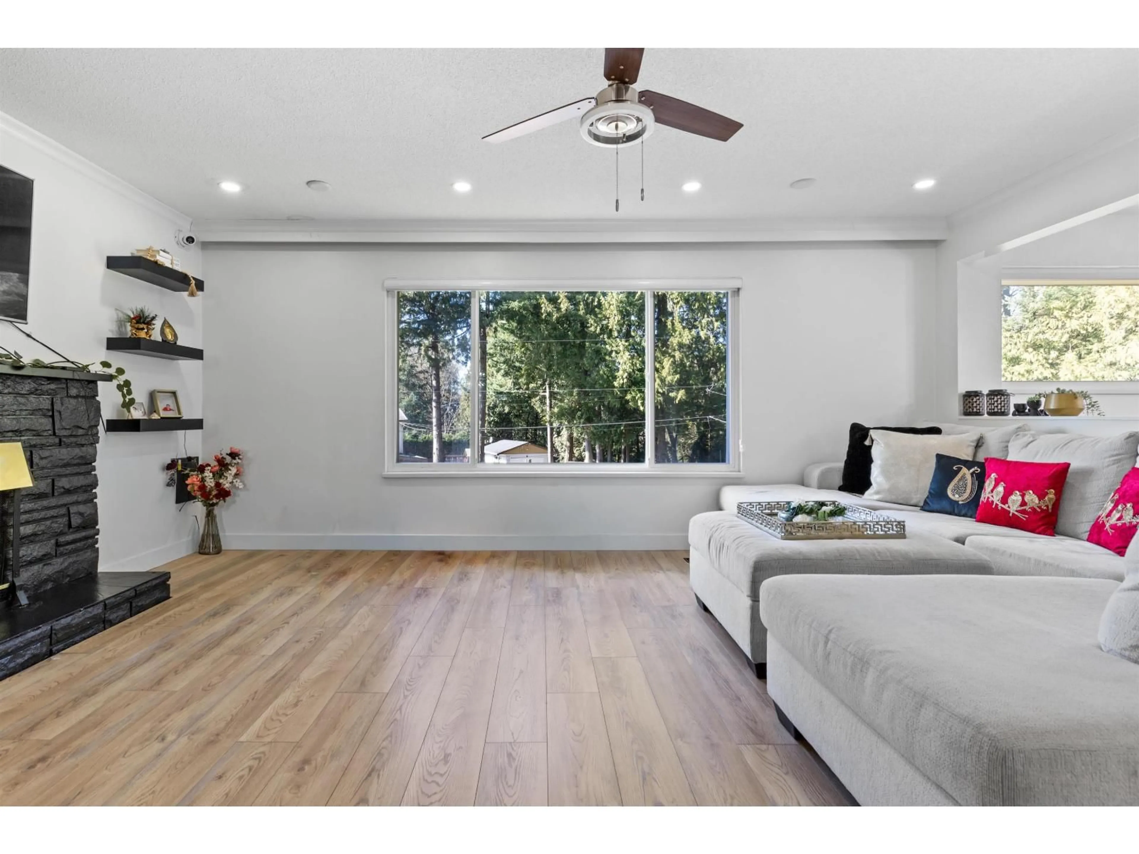 Living room with furniture, wood/laminate floor for 7334 111A STREET, Delta British Columbia V4C4S1