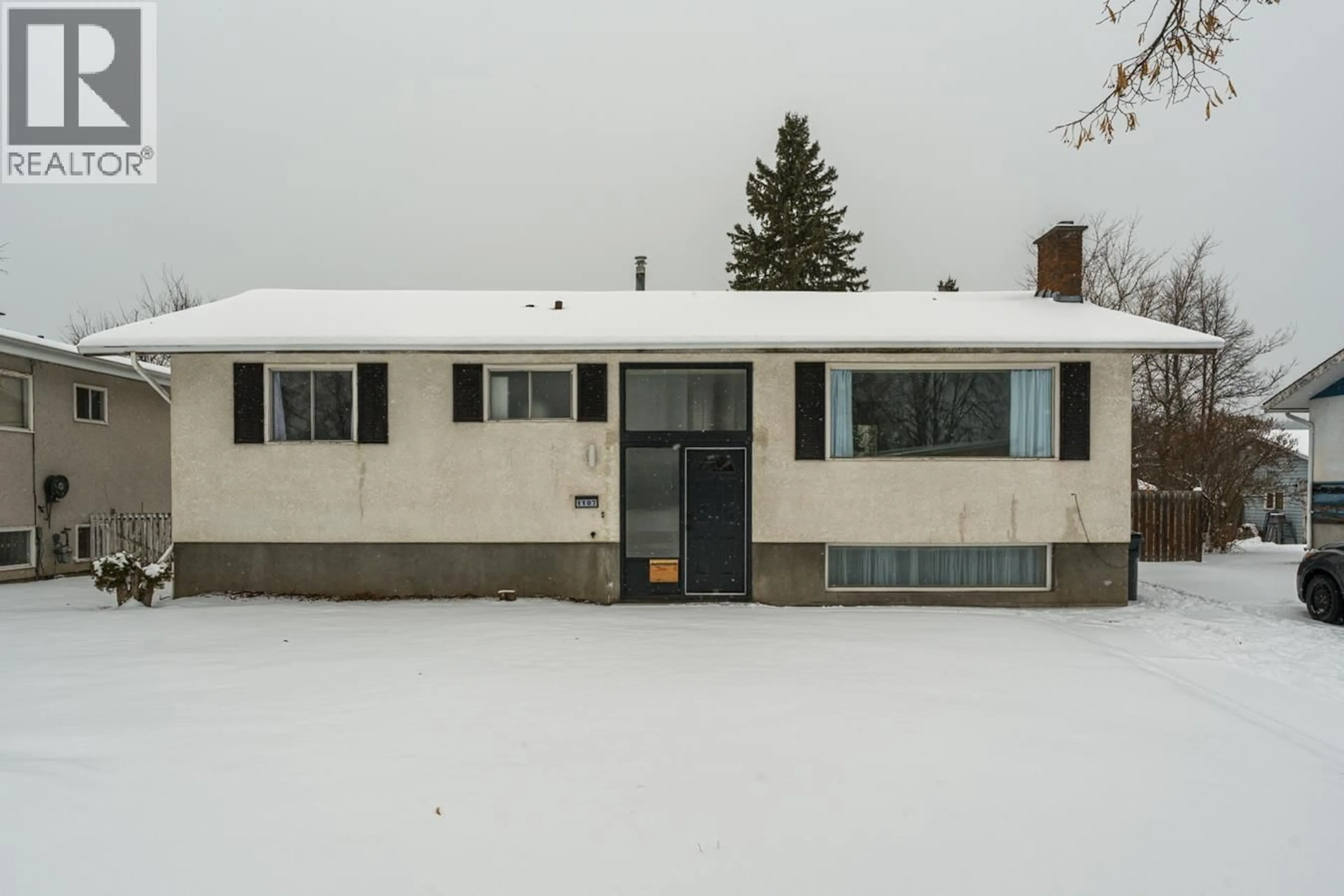 Home with vinyl exterior material, street for 1107 BEDNESTI CRESCENT, Prince George British Columbia V2M4G1