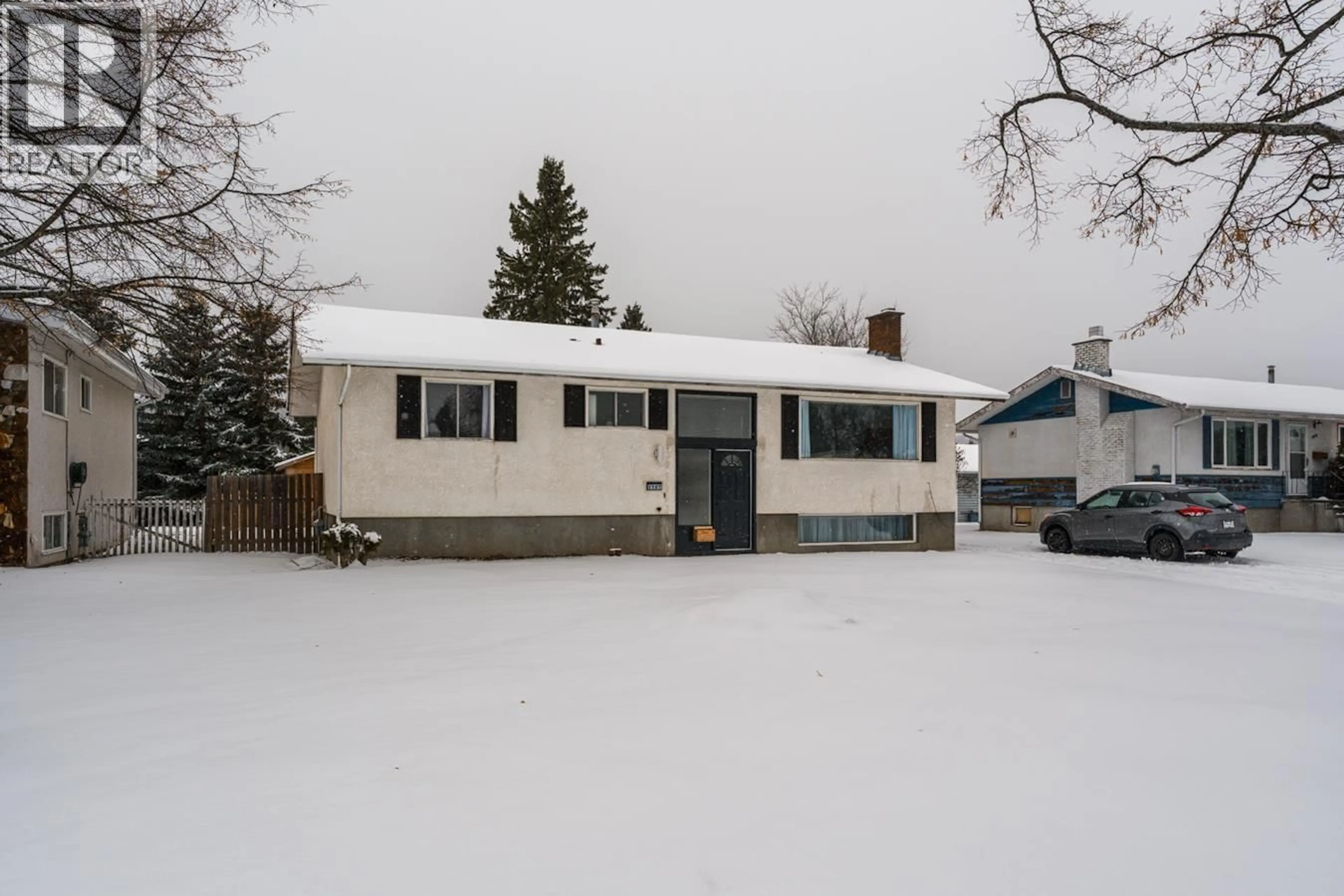 Home with vinyl exterior material, street for 1107 BEDNESTI CRESCENT, Prince George British Columbia V2M4G1