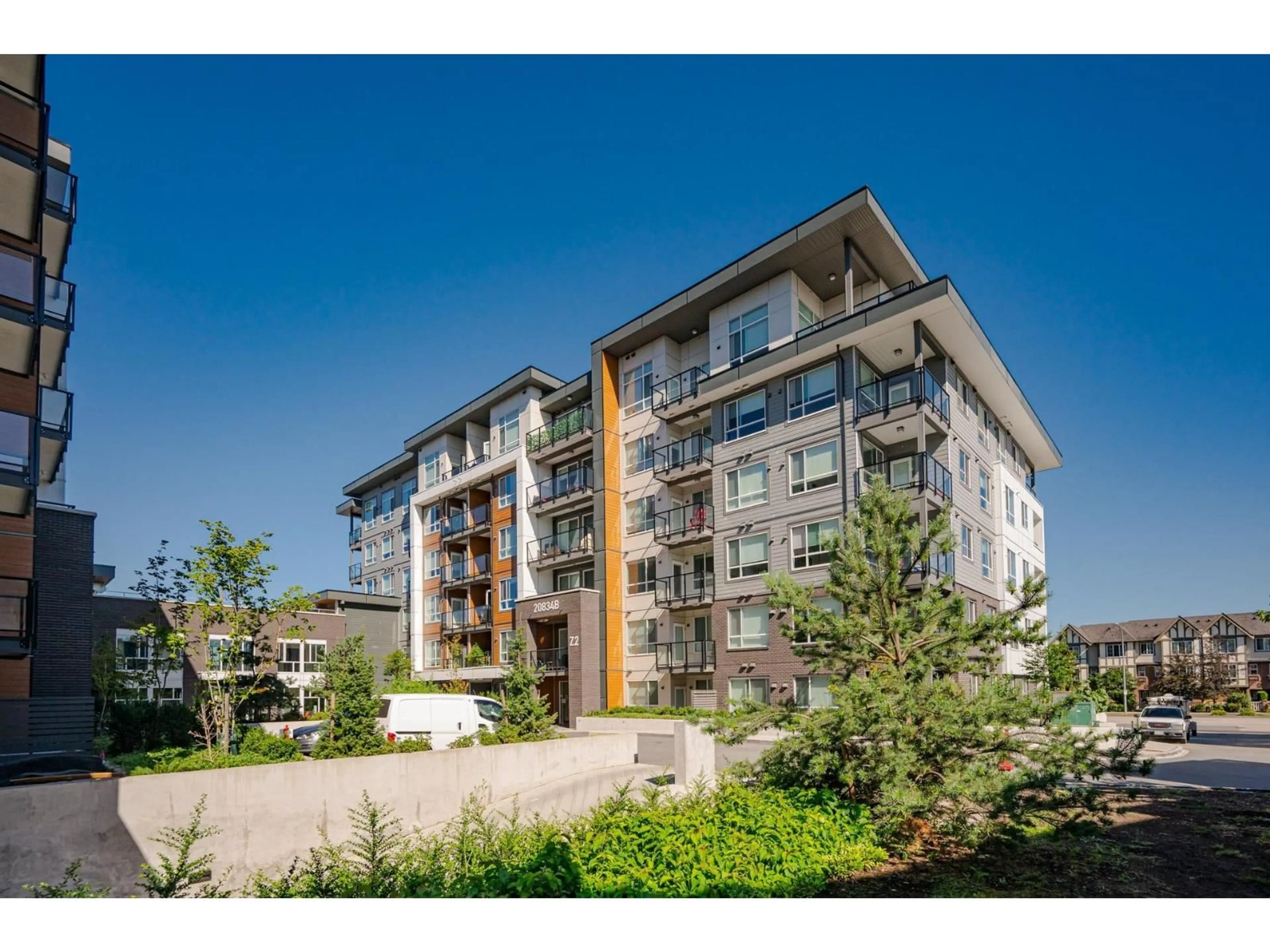 A pic from outside/outdoor area/front of a property/back of a property/a pic from drone, building for B317 - 20834 80 AVENUE, Langley British Columbia V2Y3M6