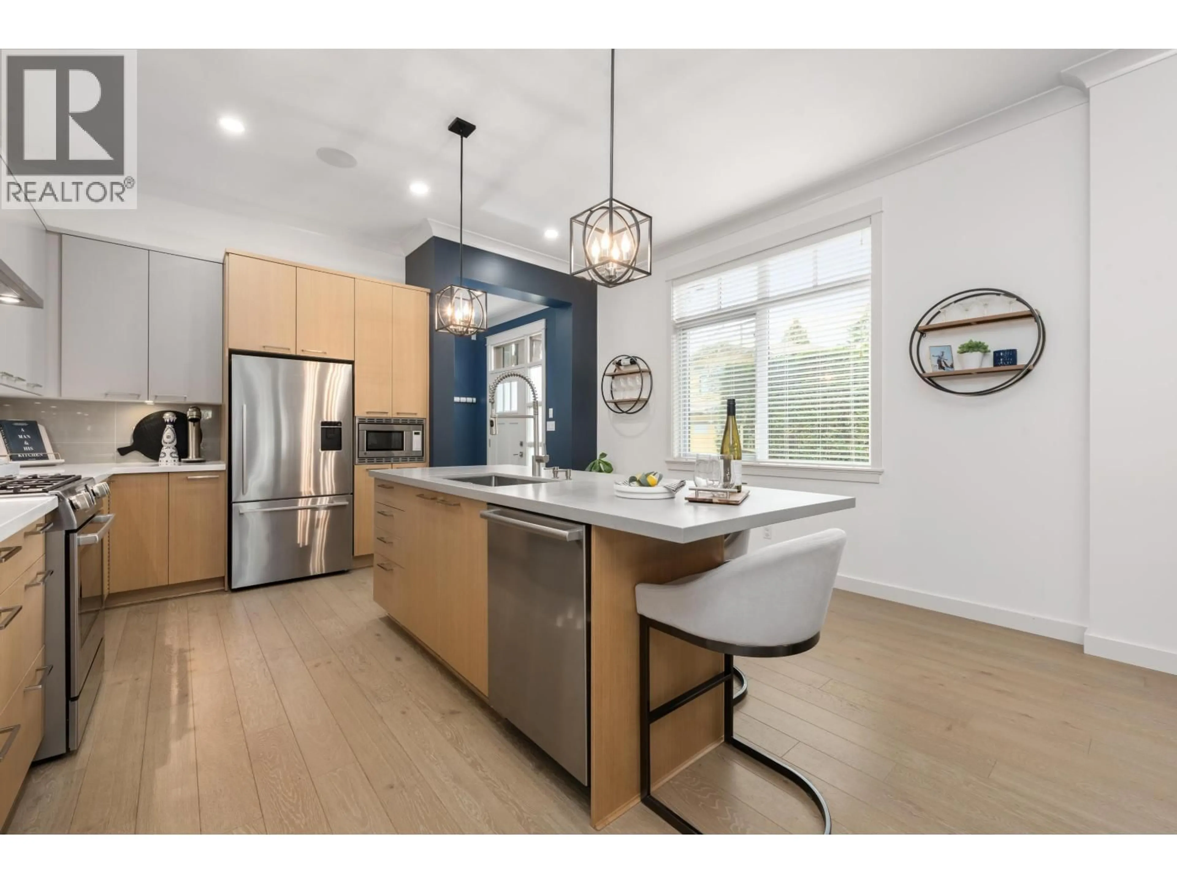 Open concept kitchen, wood/laminate floor for 4959 CEDAR SPRINGS DRIVE, Tsawwassen British Columbia V4M0A7