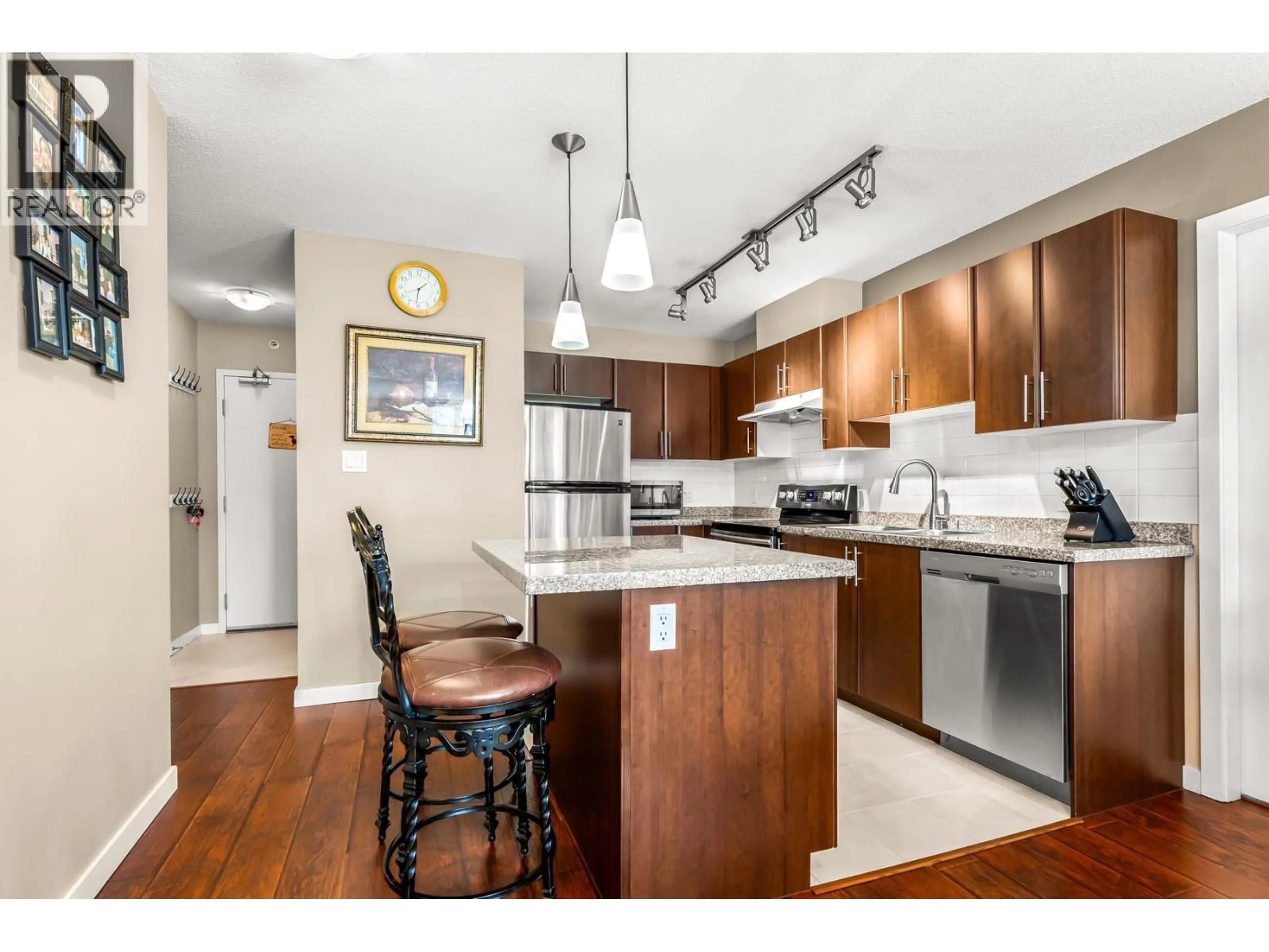 Open concept kitchen, wood/laminate floor for 602 - 1178 HEFFLEY CRESCENT, Coquitlam British Columbia V3B0A7